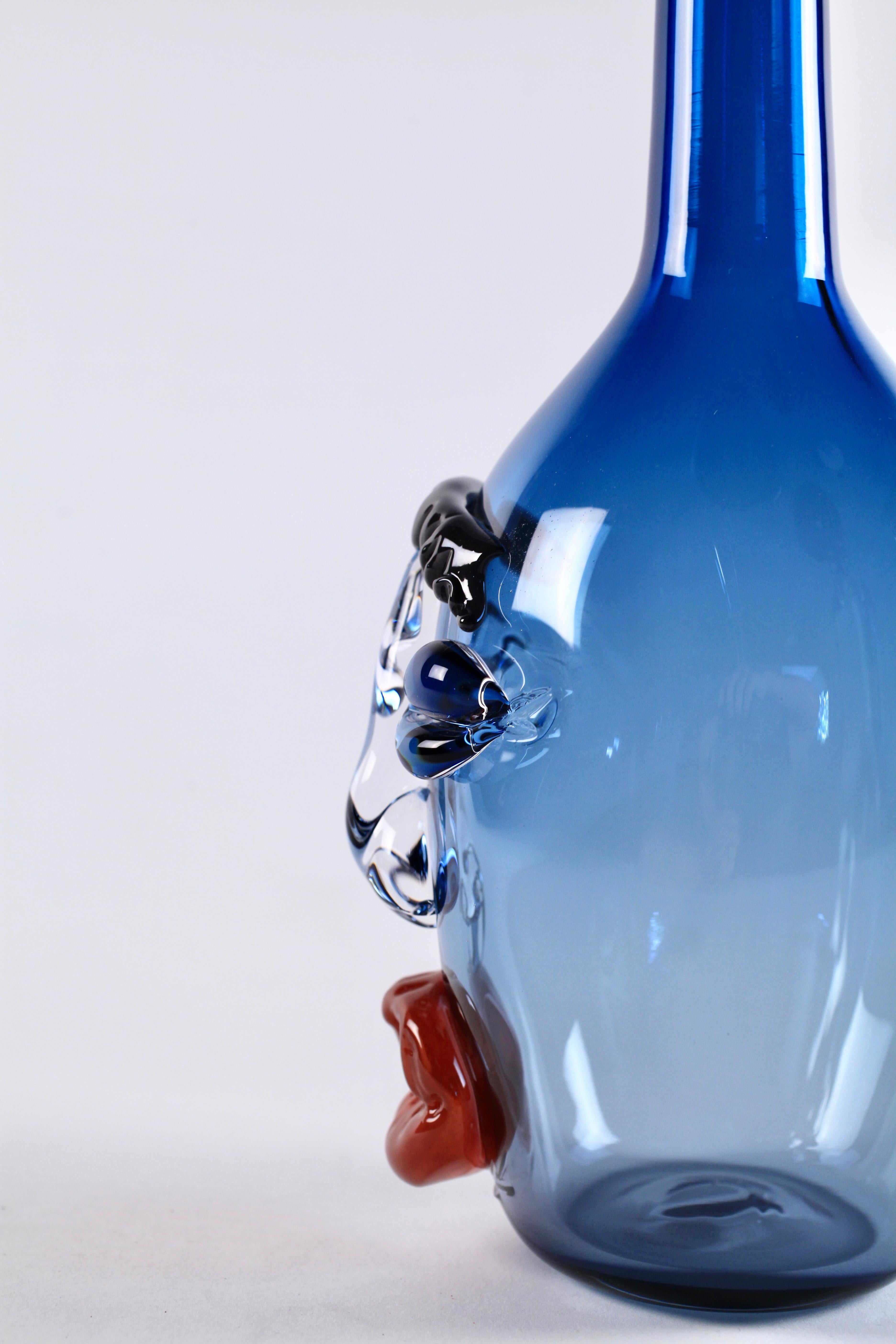 American Elizabeth Lyons Hand Blown and Sculpted Glass, Steel Blue Bottle-Head Vessel For Sale