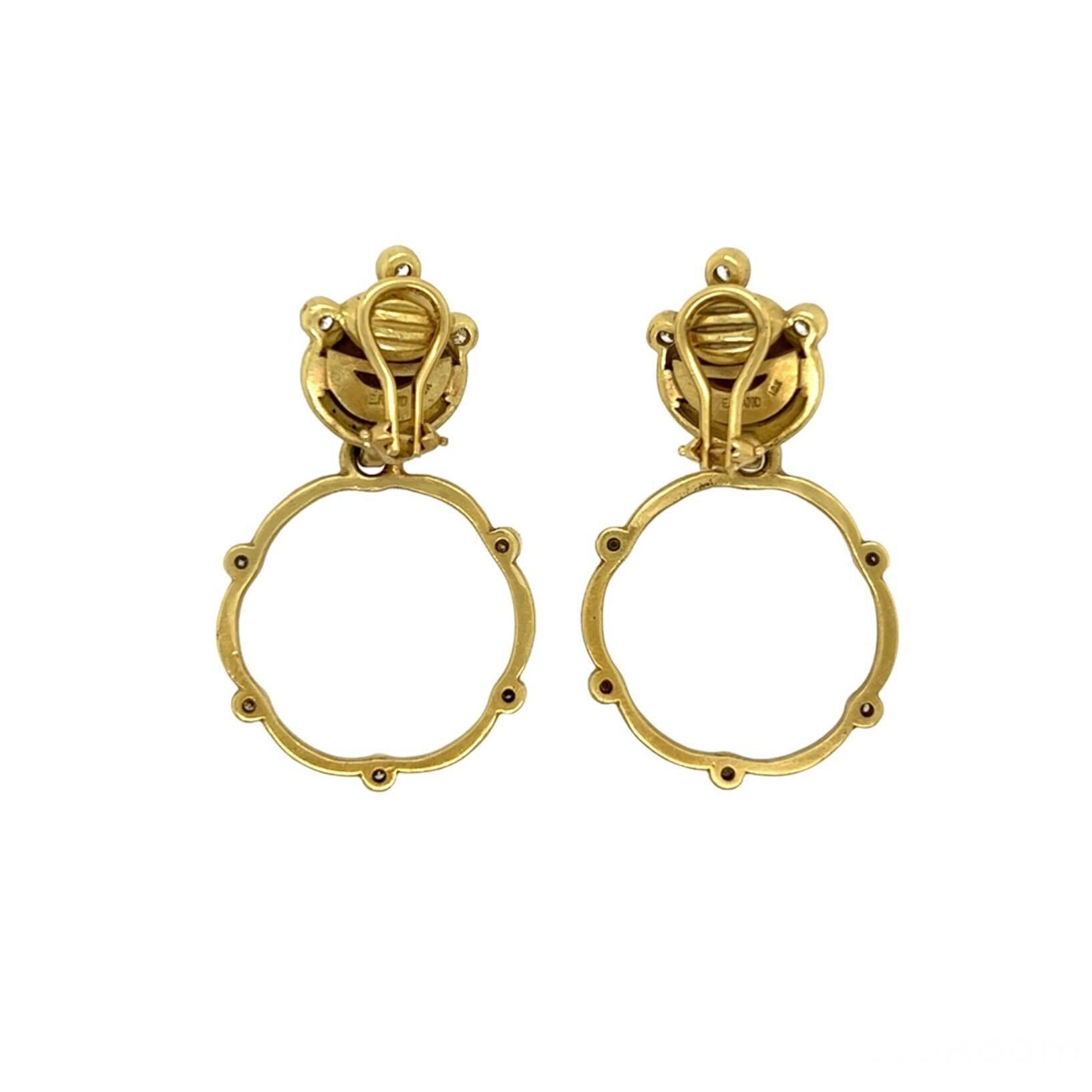 A pair of 18 karat yellow gold and diamond earclips, Elizabeth Rand.  Each earclip designed as a matte yellow gold dome set with three (3) brilliant cut diamonds suspending a scallop edged hoop set with five (5) brilliant cut diamonds.  Total