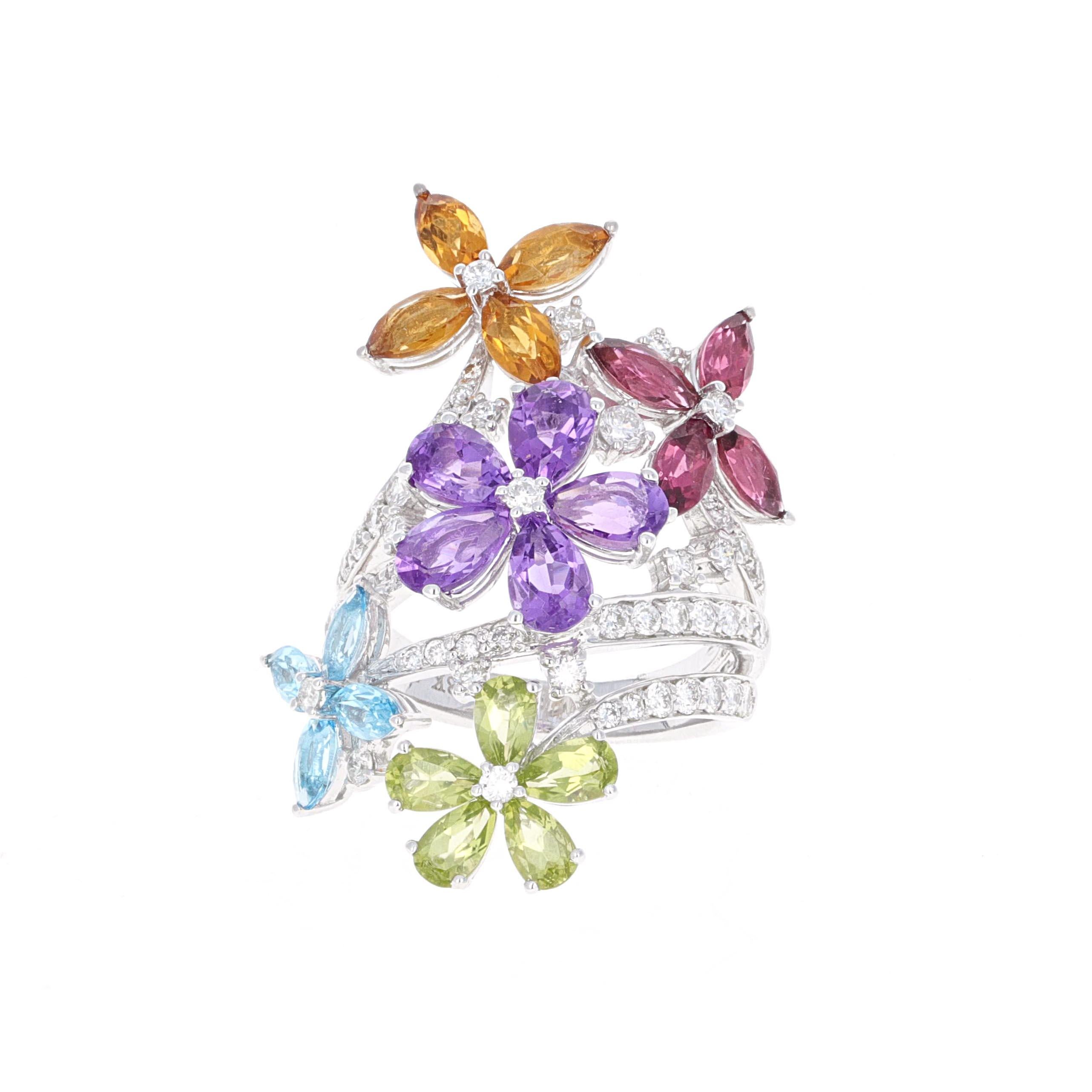 Handmade beautiful Semi Precious gem stone and diamond ring by Elizabeth Taylor Collection, House of Taylor. This ring is made in 18k white gold. These semi precious stones are made to look like flowers cascading up and down your finger. They are