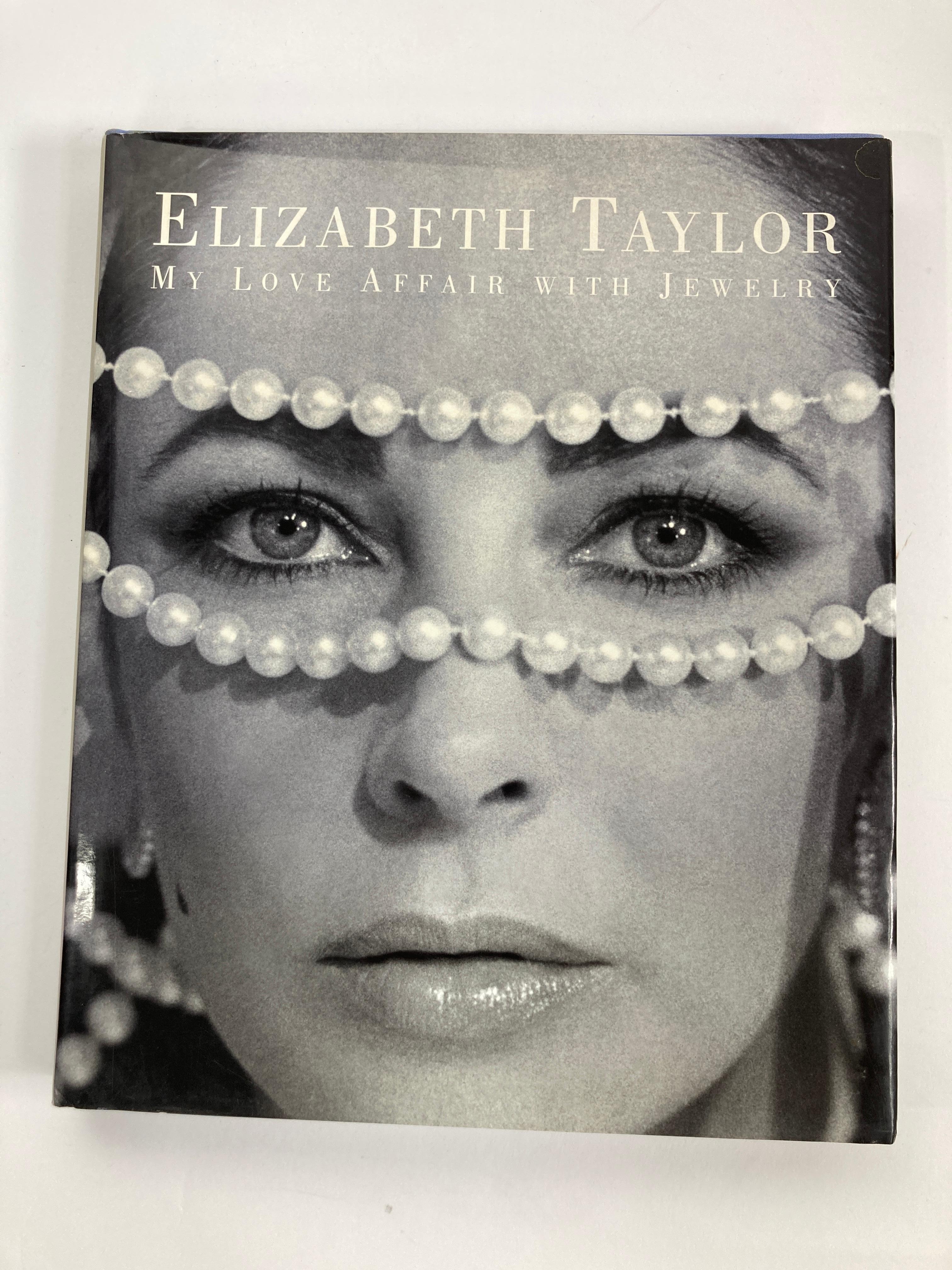  Elizabeth Taylor: My Love Affair With Jewelry 1st Edition Hardcover Book
Edited by Ruth A. Peltason. 280 illustrations, including 175 color photographs by John Bigelow Taylor.

