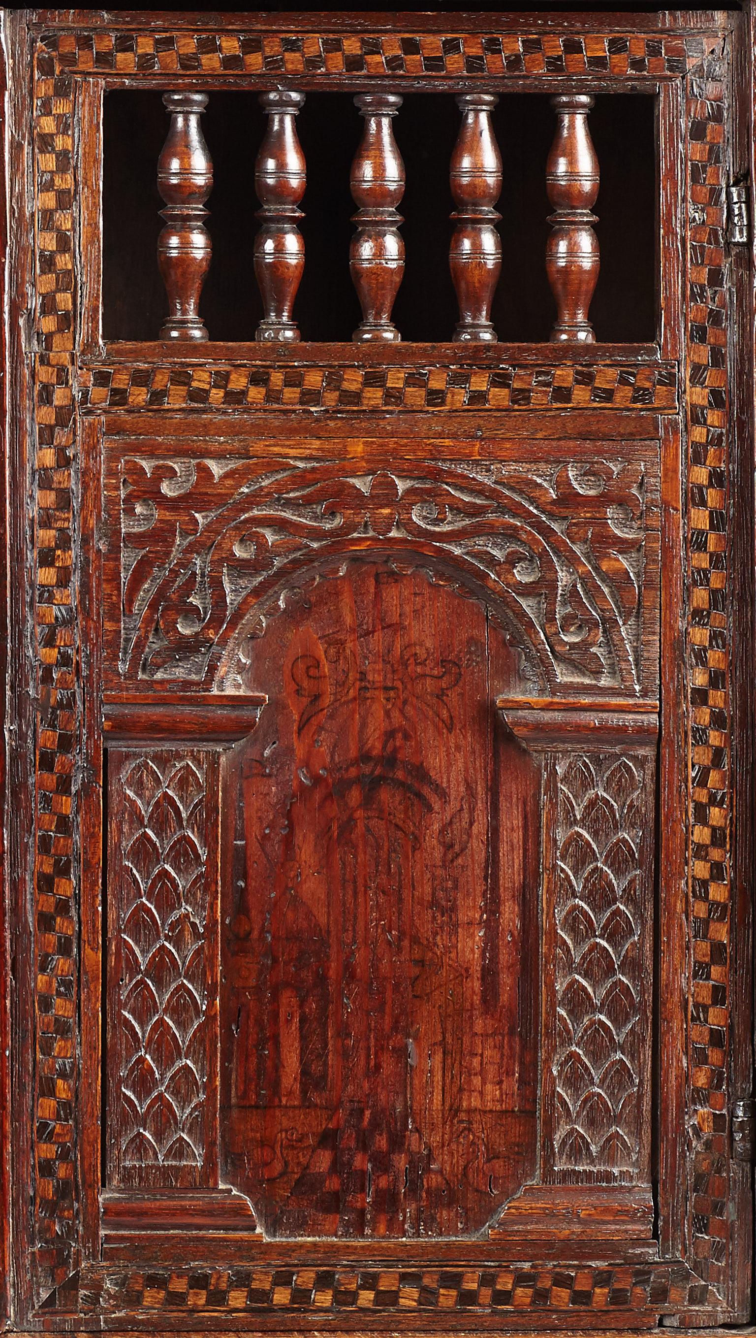 Carved Elizabethan Pine, Oak, and Pen-Work Decorated Wall Glass Cupboard, circa 1580