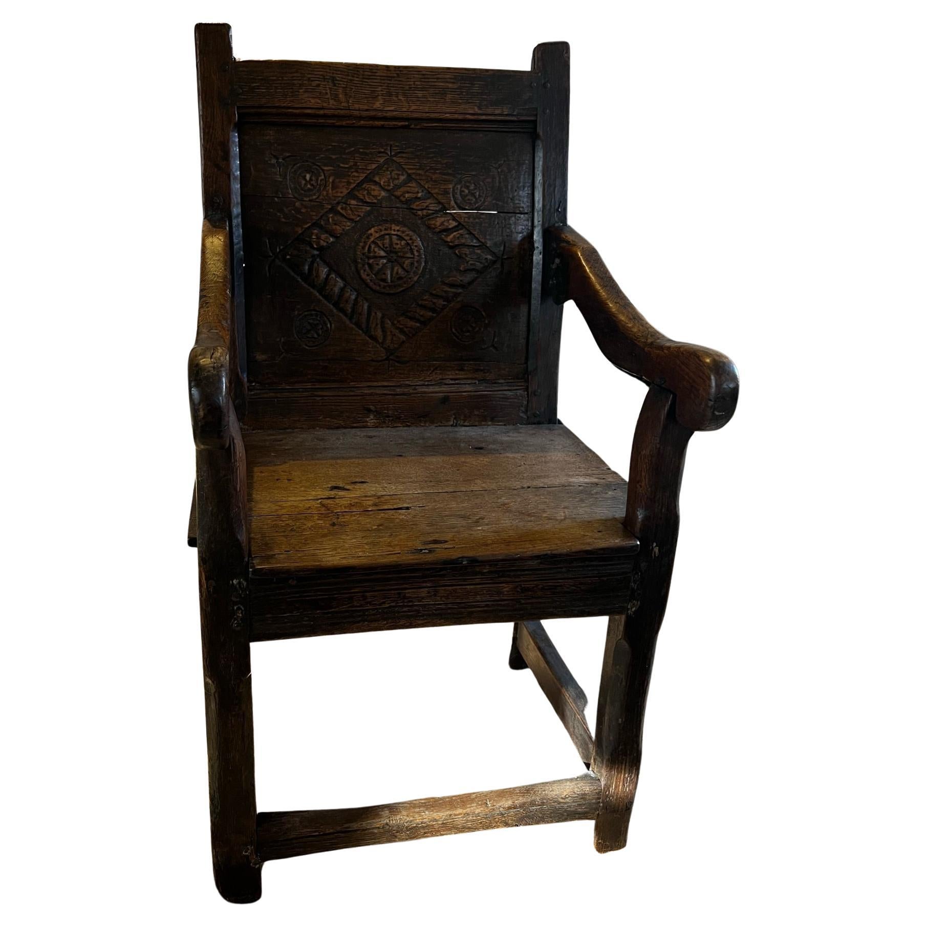 This gorgeous Elizabethan chair would be an asset to any space with its simple and modern shape and carved details its spectacular!
the color of the wood and rustic patina make it quite special.