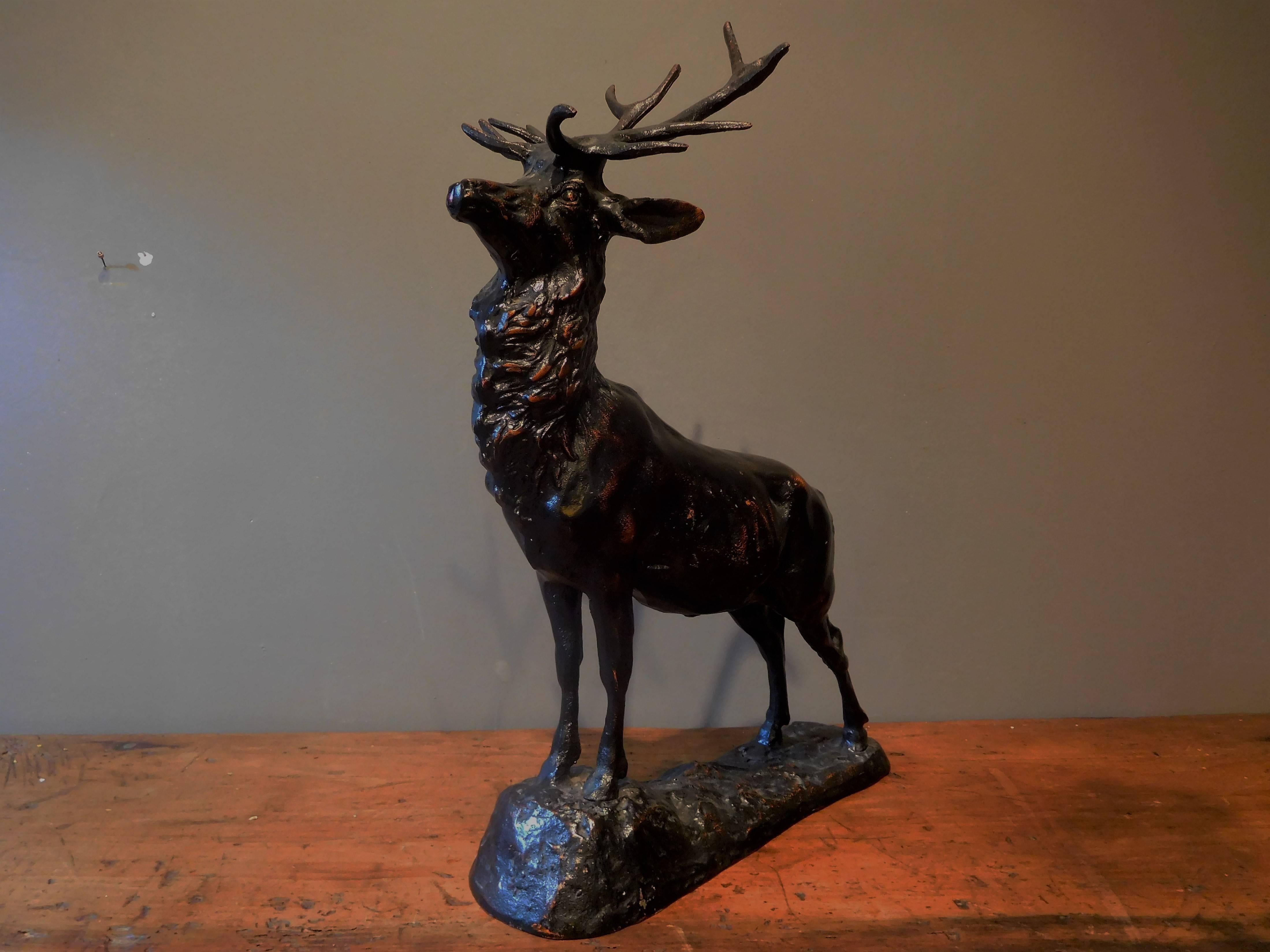 This Sporting Art table sculpture of an Elk is in finely cast zinc alloy which is patinated in bronze with black and burnt-sienna accents. The statue is 16