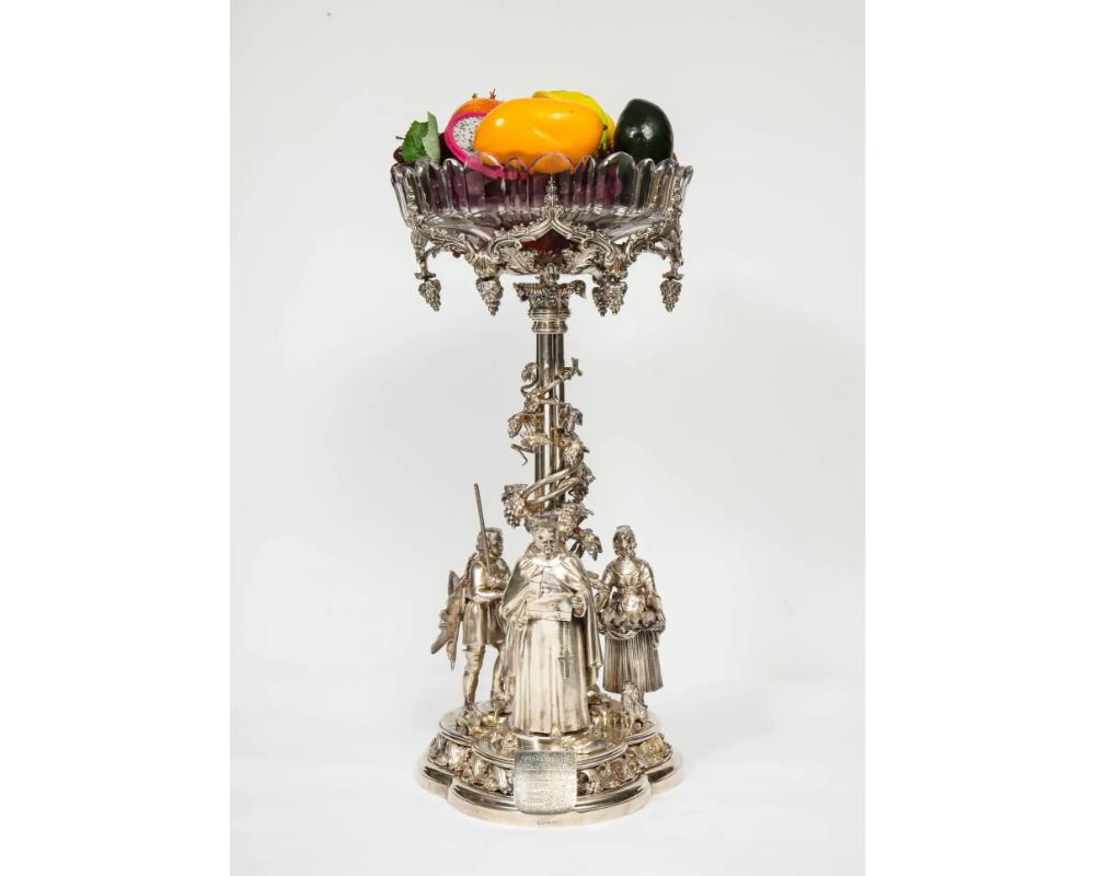 Elkington Mason & Co. A rare, important, and historic silvered bronze centerpiece, with original cut-glass bowl.

Victorian period, dated 1859, Birmingham, hallmarked to the base.

This centerpiece is made of exquisite craftsmanship and quality. The