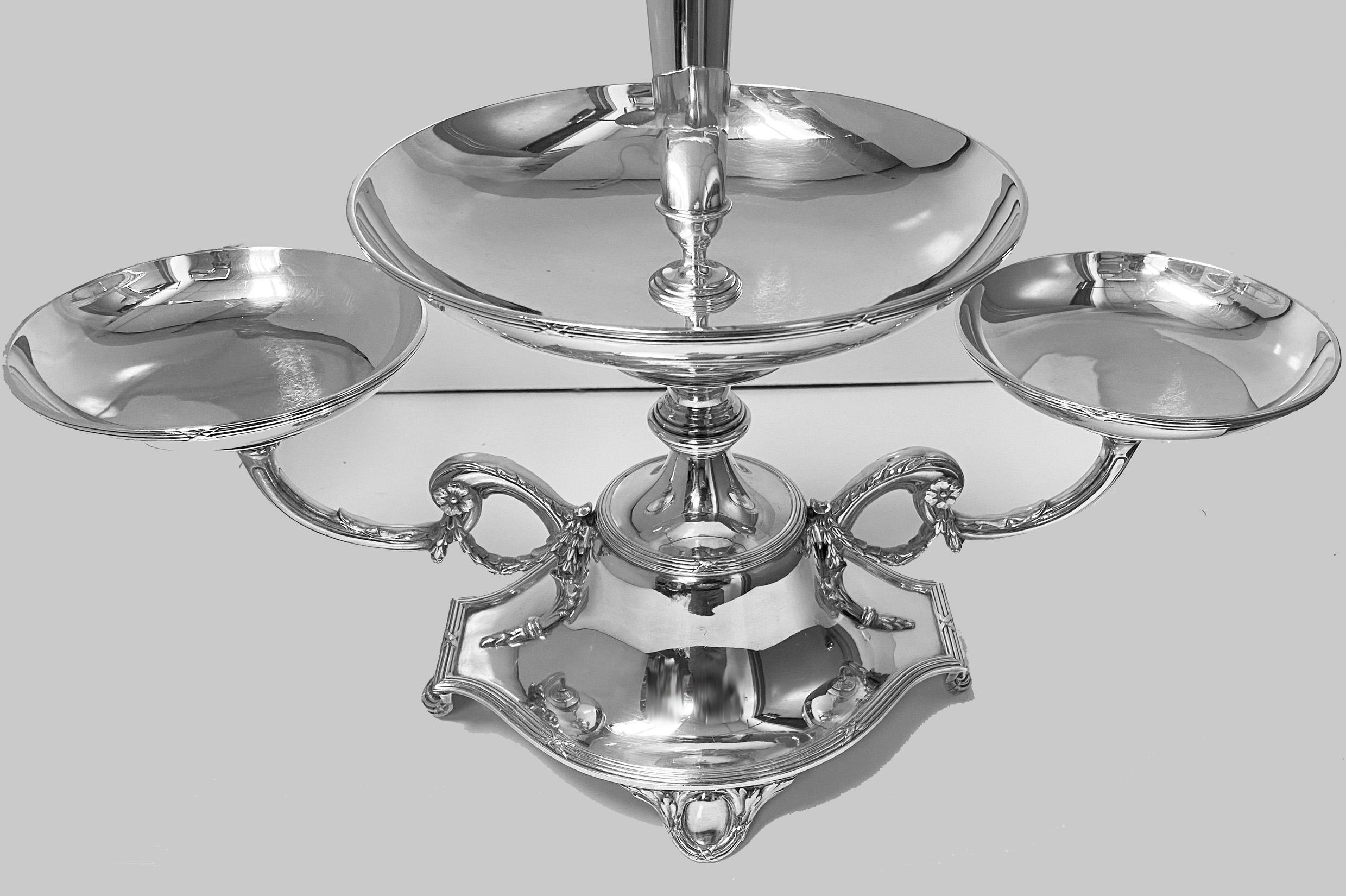 Elkington silver plate centerpiece Epergne for fruit and flowers, 1925. This is for both flowers and fruit and makes a spectacular table decoration. On shaped oval base with four acanthus supports central section with large bowl and two side