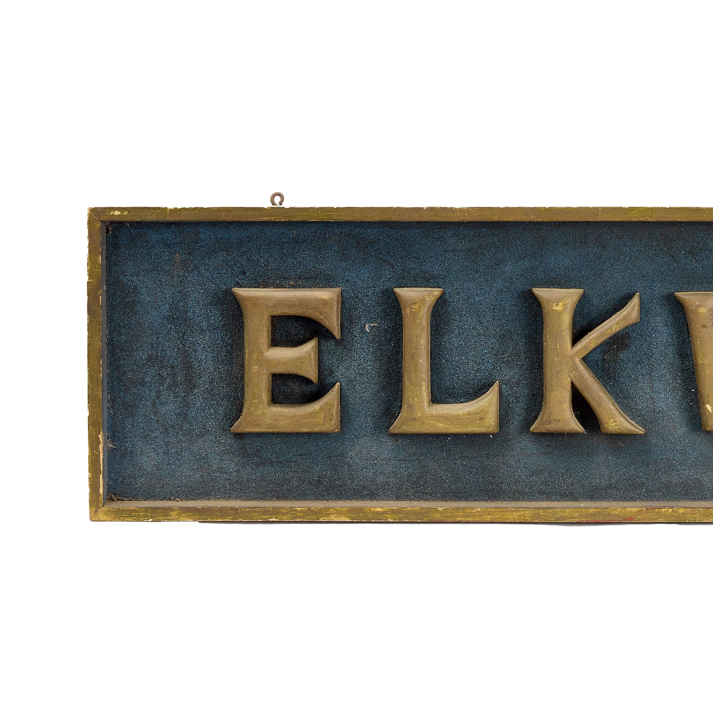 With carved gilt wood letters with mounted against a blue painted sand ground
American, c. 1890.

