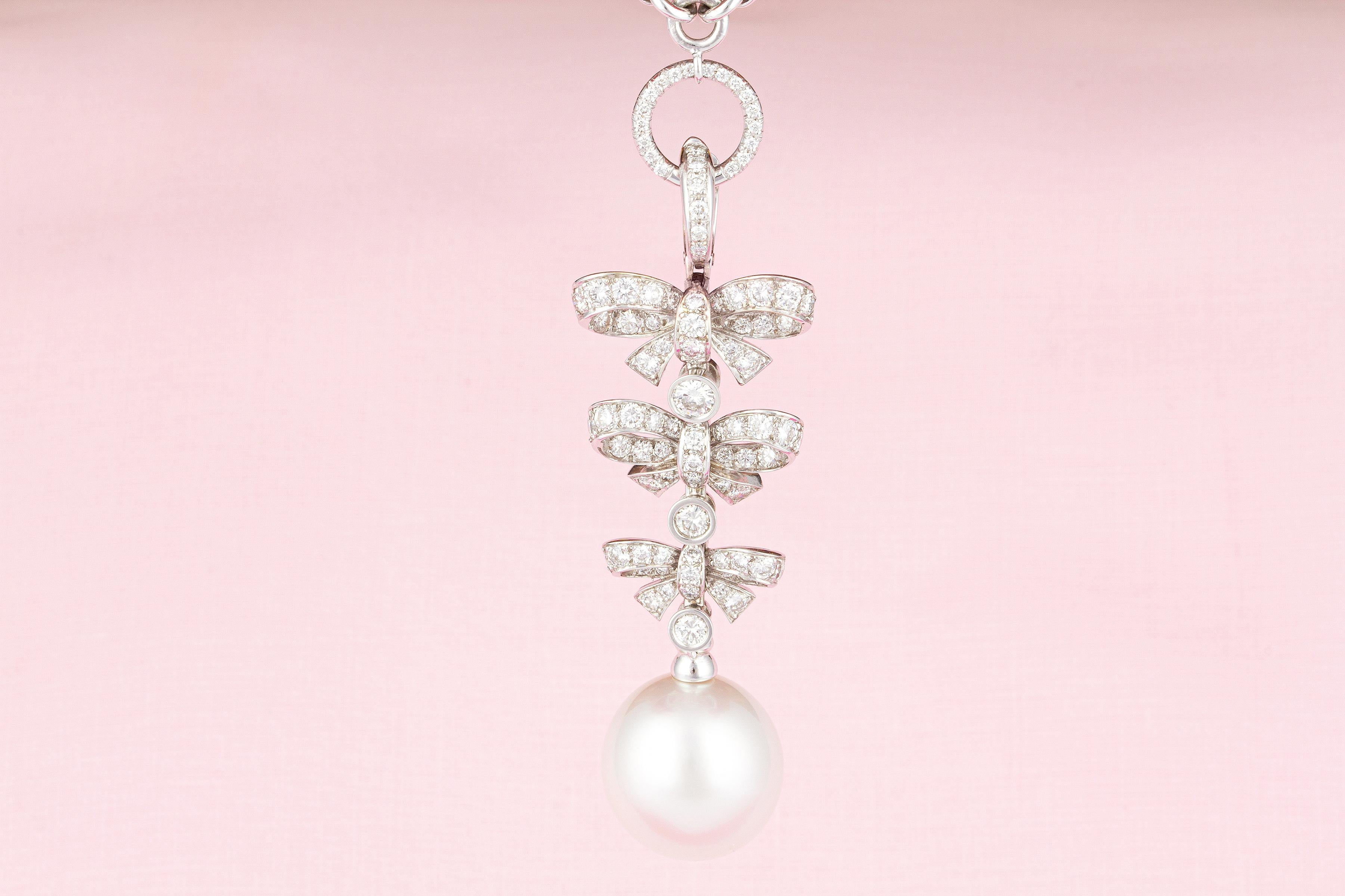 Round Cut Bow Pendant Necklace with Diamonds and 17mm Pearl Design by Ella Gafter For Sale