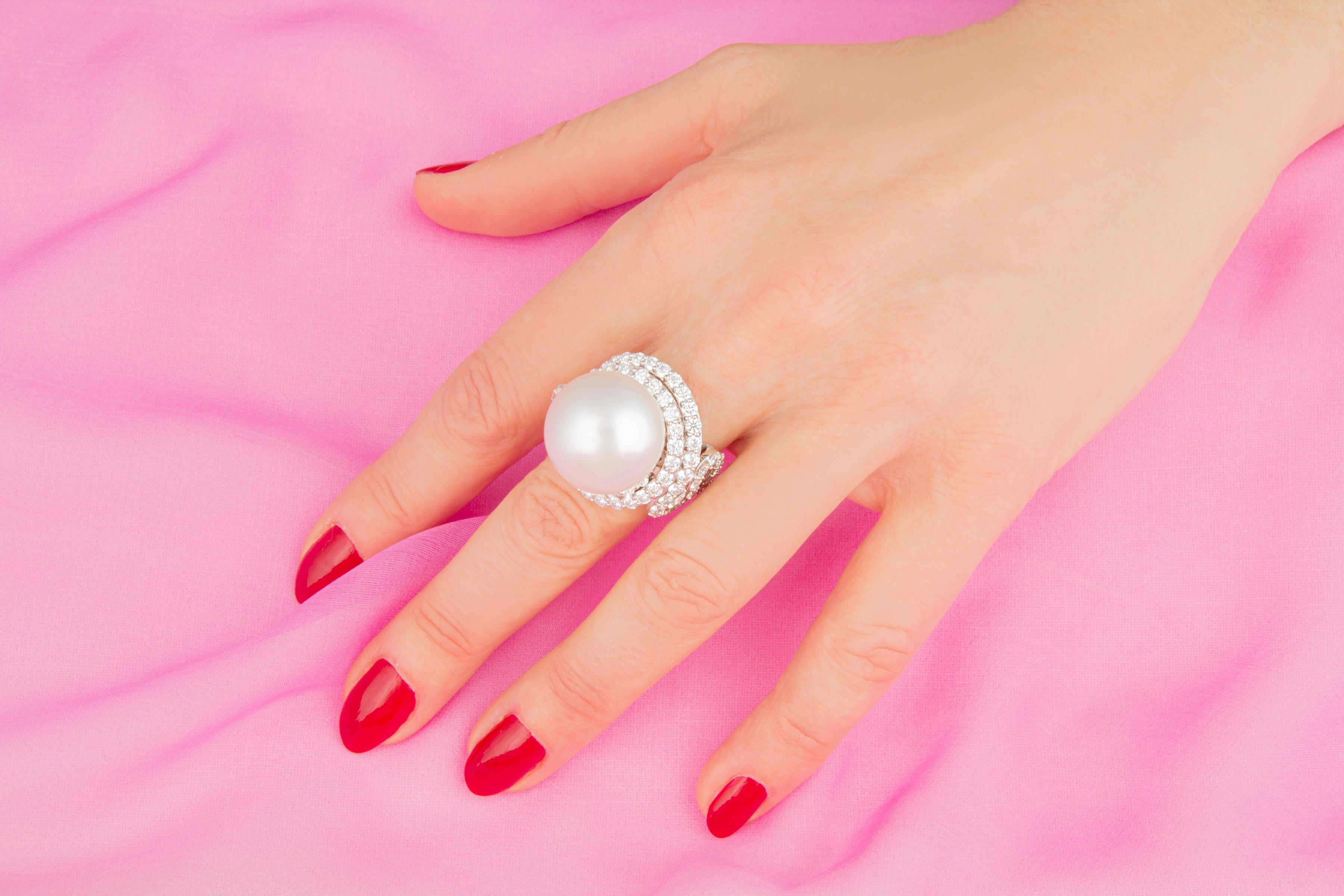 The South Sea pearl and diamond cocktail ring features a gem quality pearl of the extraordinary size of 19mm diameter. The pearl is untreated. It displays a splendid nacre and its natural color and luster have not been enhanced in any way. The pearl