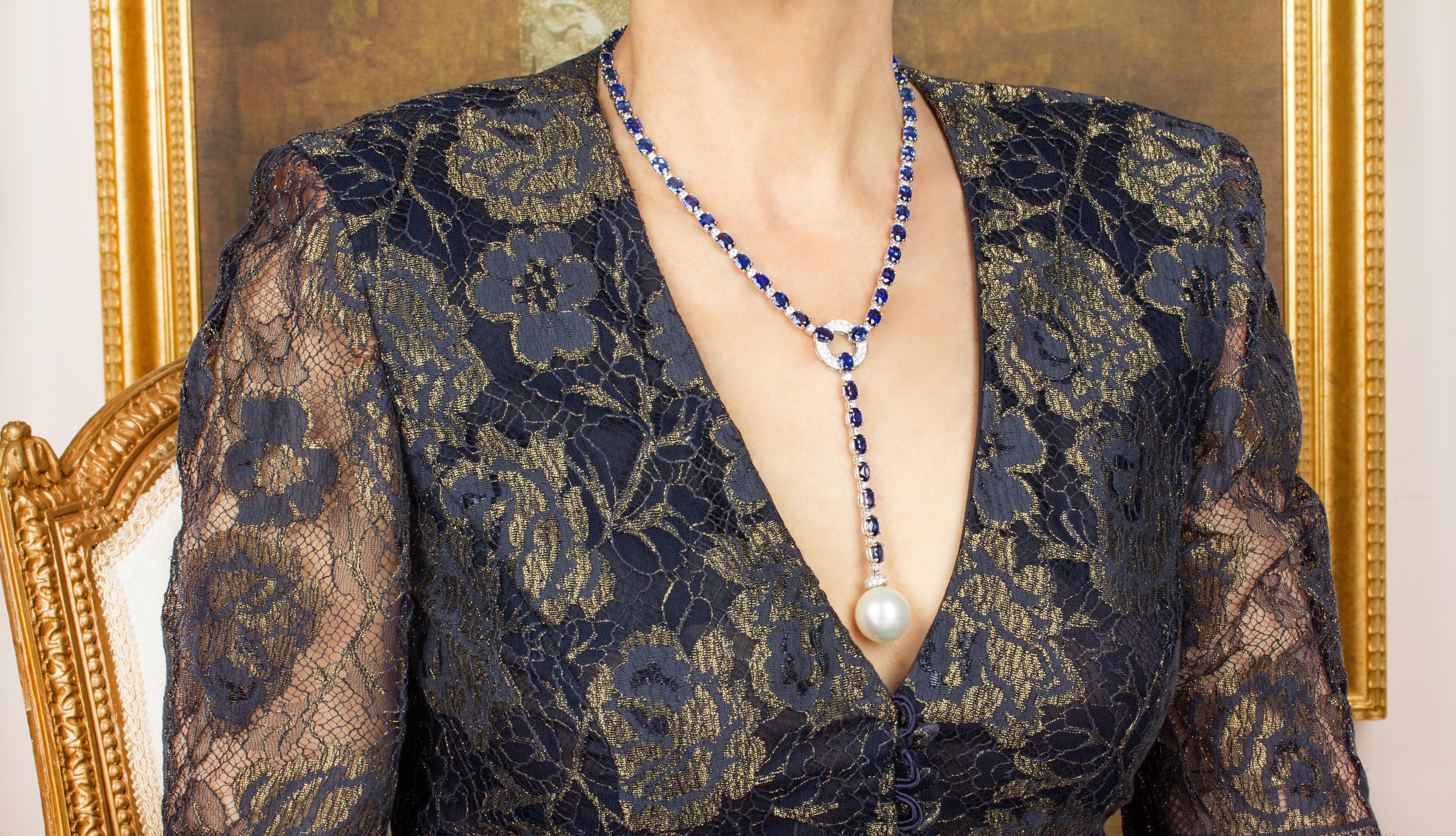 The blue sapphire necklace features 71.47 carats of brilliant faceted blue sapphires of oval cut laying perfectly on the neck. The splendid sapphires of royal blue color and crystalline texture are interleaved with round diamonds of top quality
