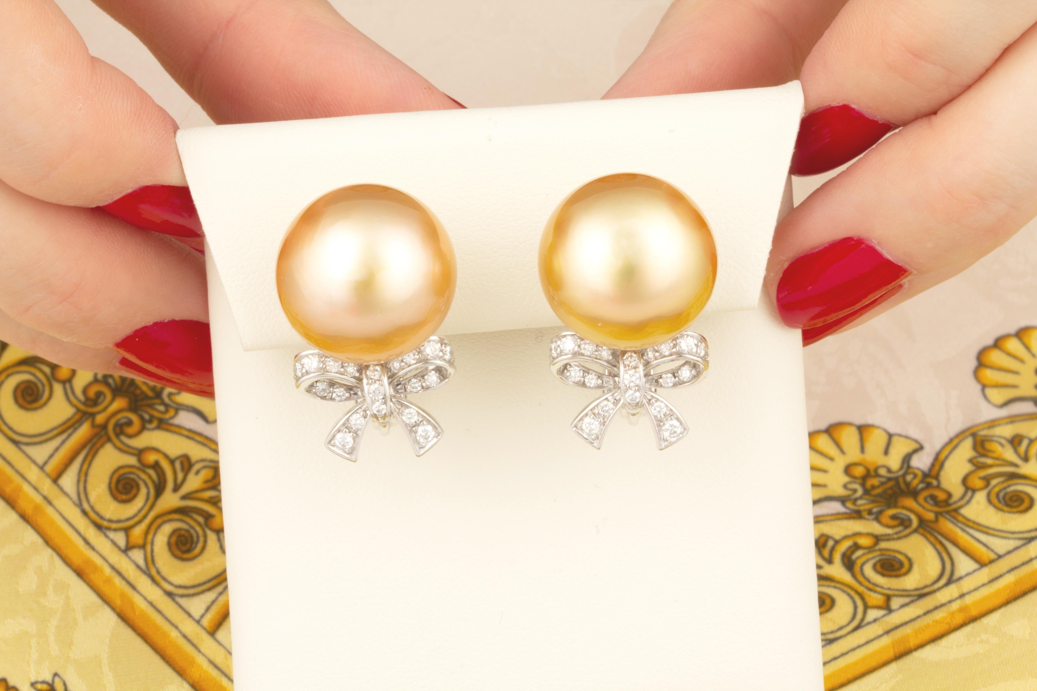 bow pearl earrings