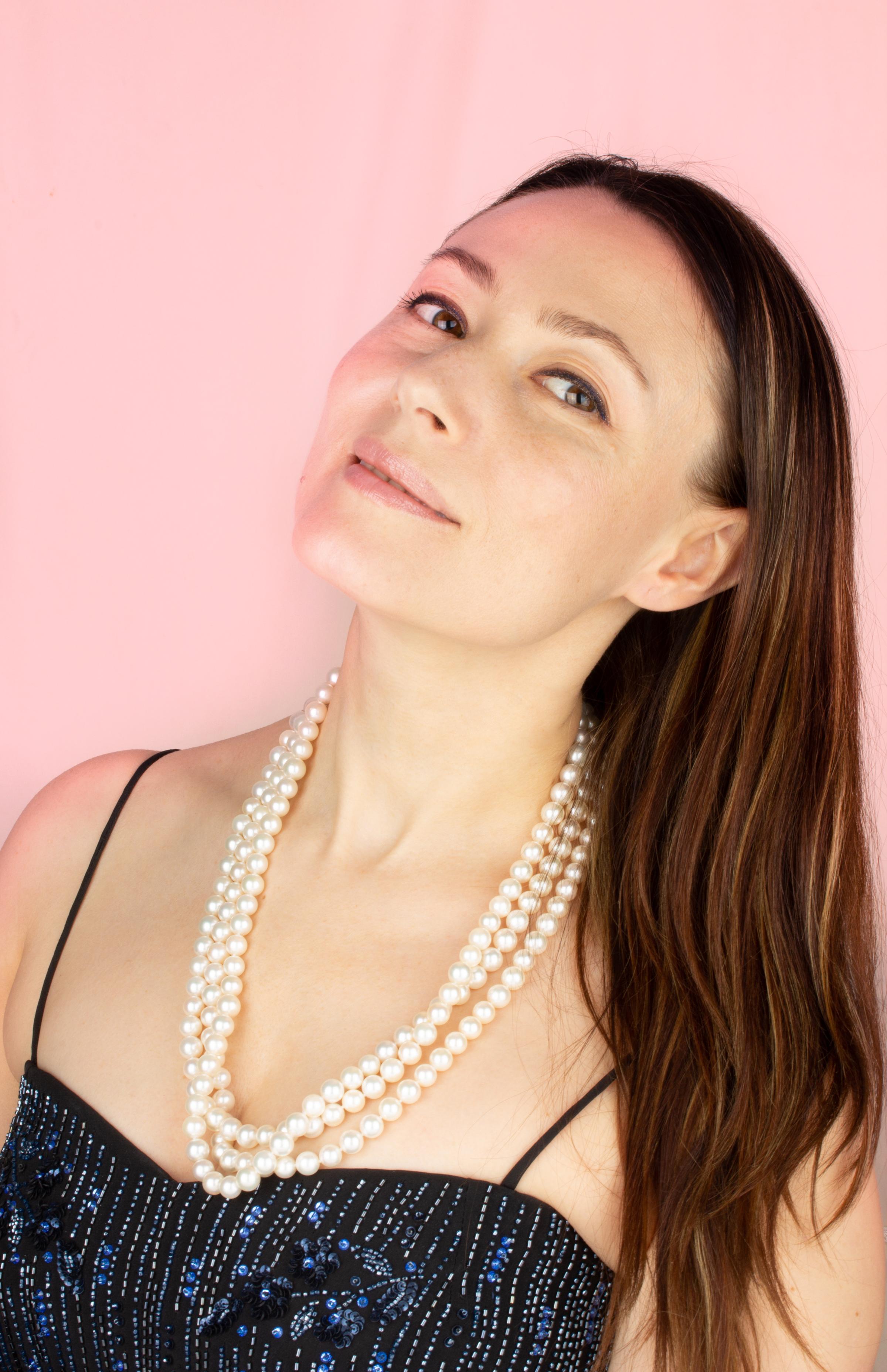 The 75” Japanese Akoya pearl necklace consists of 205 round pearls (Pinctada Fucata) of 8.5/9mm diameter. The pearls display a lovely nacre, lustre, and iridescence. The necklace is held together by a handmade 18 carat white gold clasp decorated