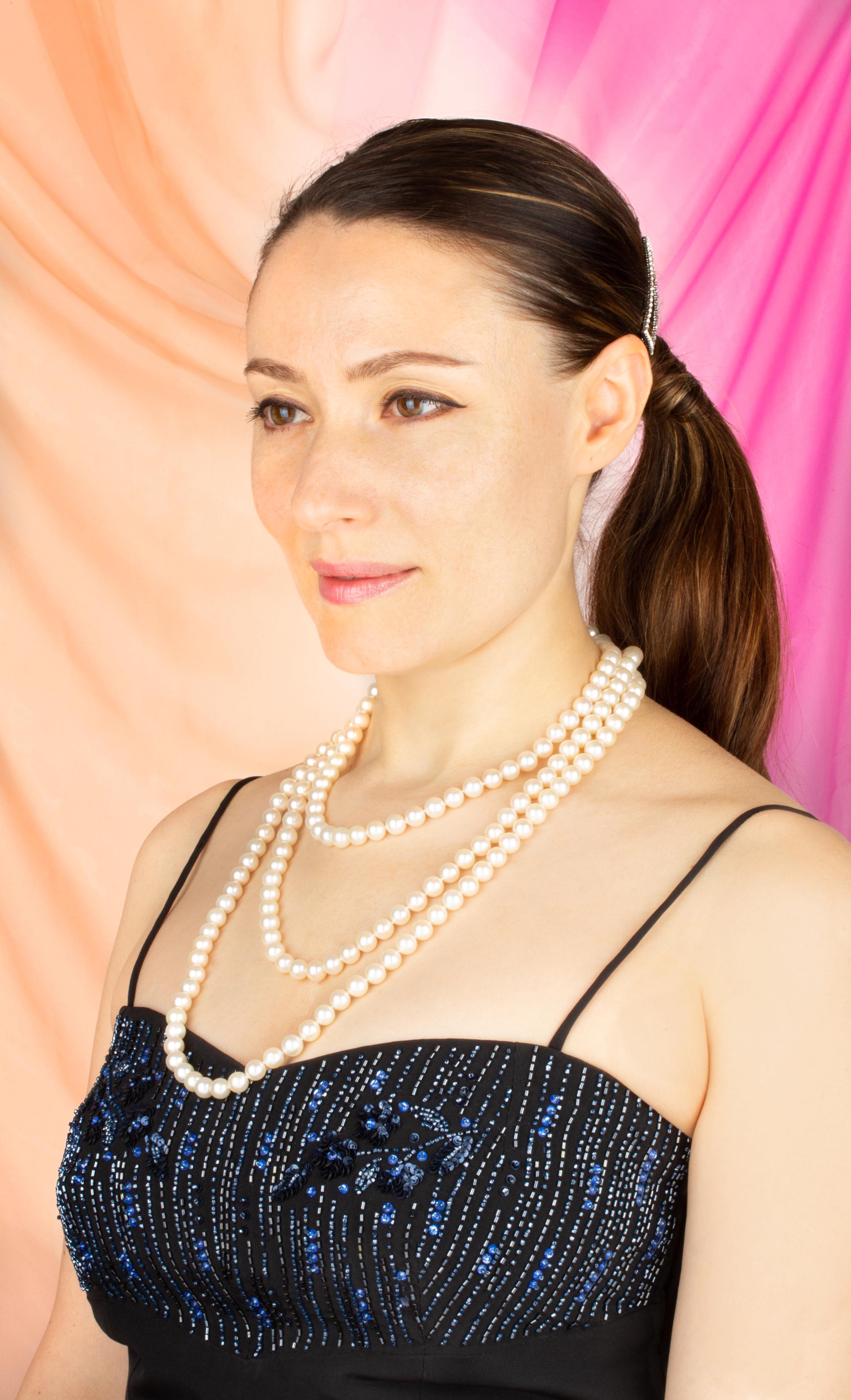 The 66” Japanese Akoya pearl necklace consists of 189 round pearls (Pinctada Fucata) of 8.5/9mm diameter. The pearls display a lovely nacre, lustre, and iridescence. The necklace is held together by a handmade 18 carat white gold clasp decorated