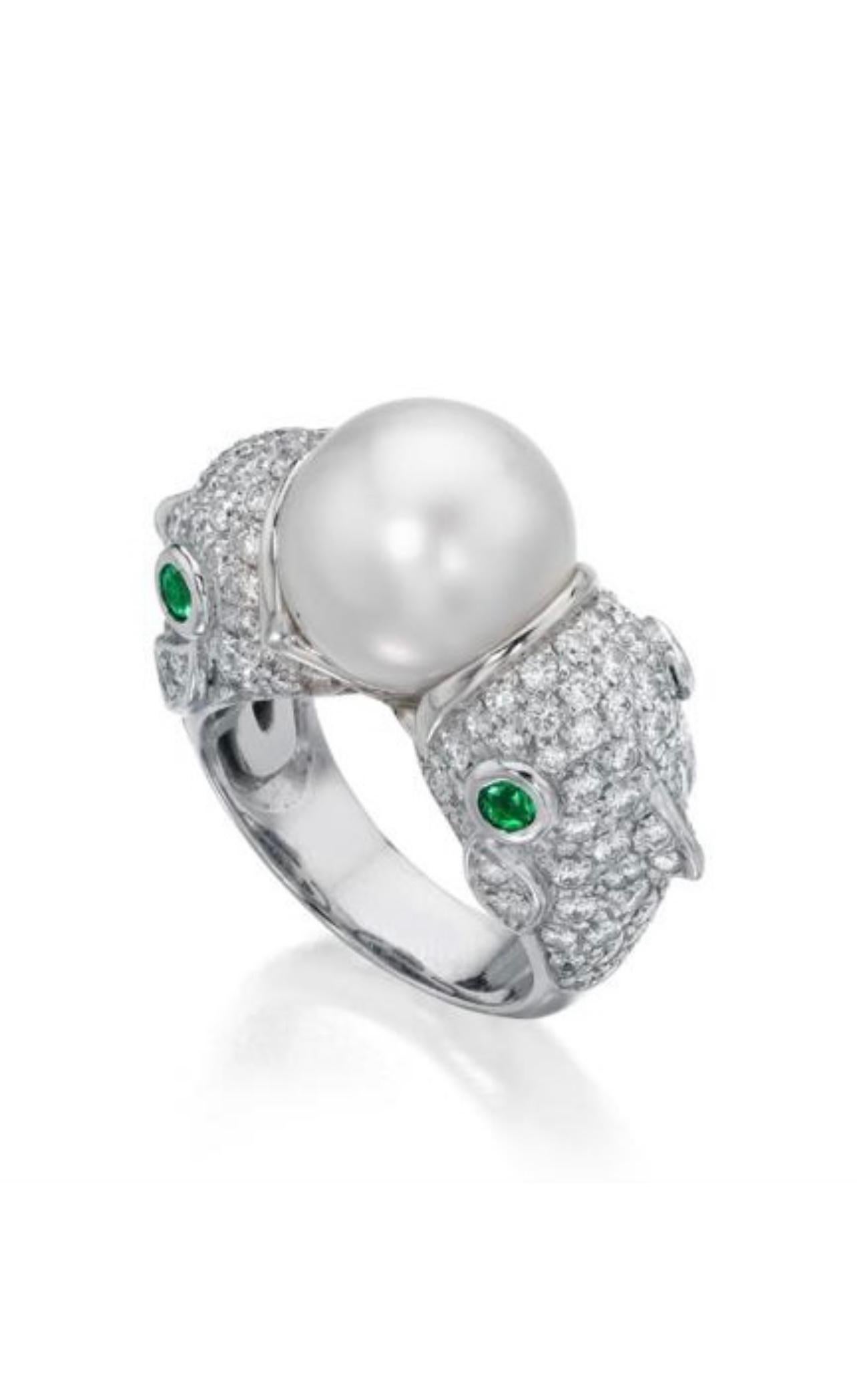 Ella Gafter South Sea Pearl Diamond And Emerald zodiac pisces ring beautifully handcrafted in 18k white gold. 
The details are as follows: 
Pearl: 14mm untreated south sea pearl. The pearl displays its natural color and hasn't been enhanced in any