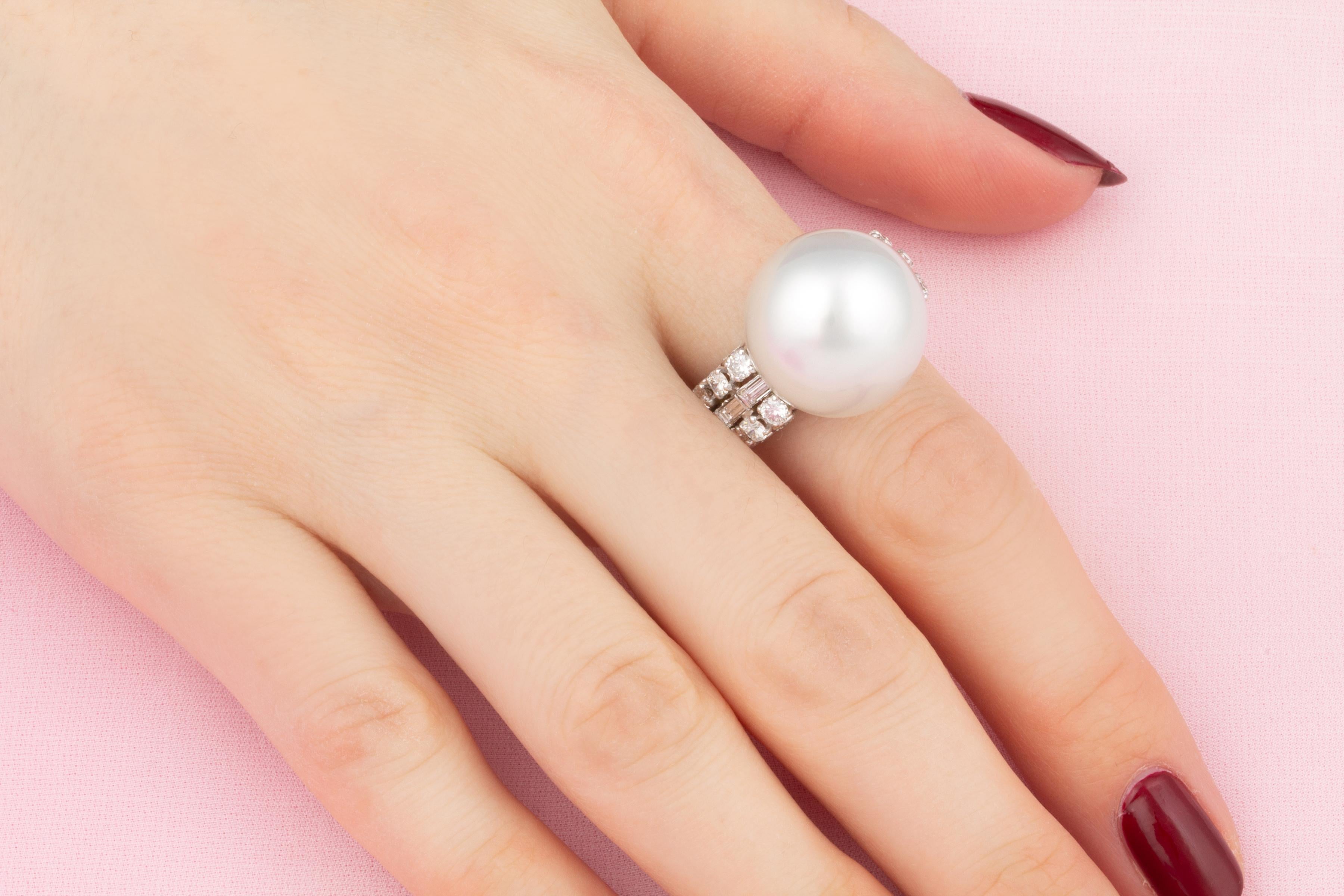 This ring features a South Sea pearl of 16.50mm diameter. The pearl is untreated. It displays a splendid nacre and its natural color and luster have not been enhanced in any way. The pearl is perched atop a symmetrical openwork design with 0.60