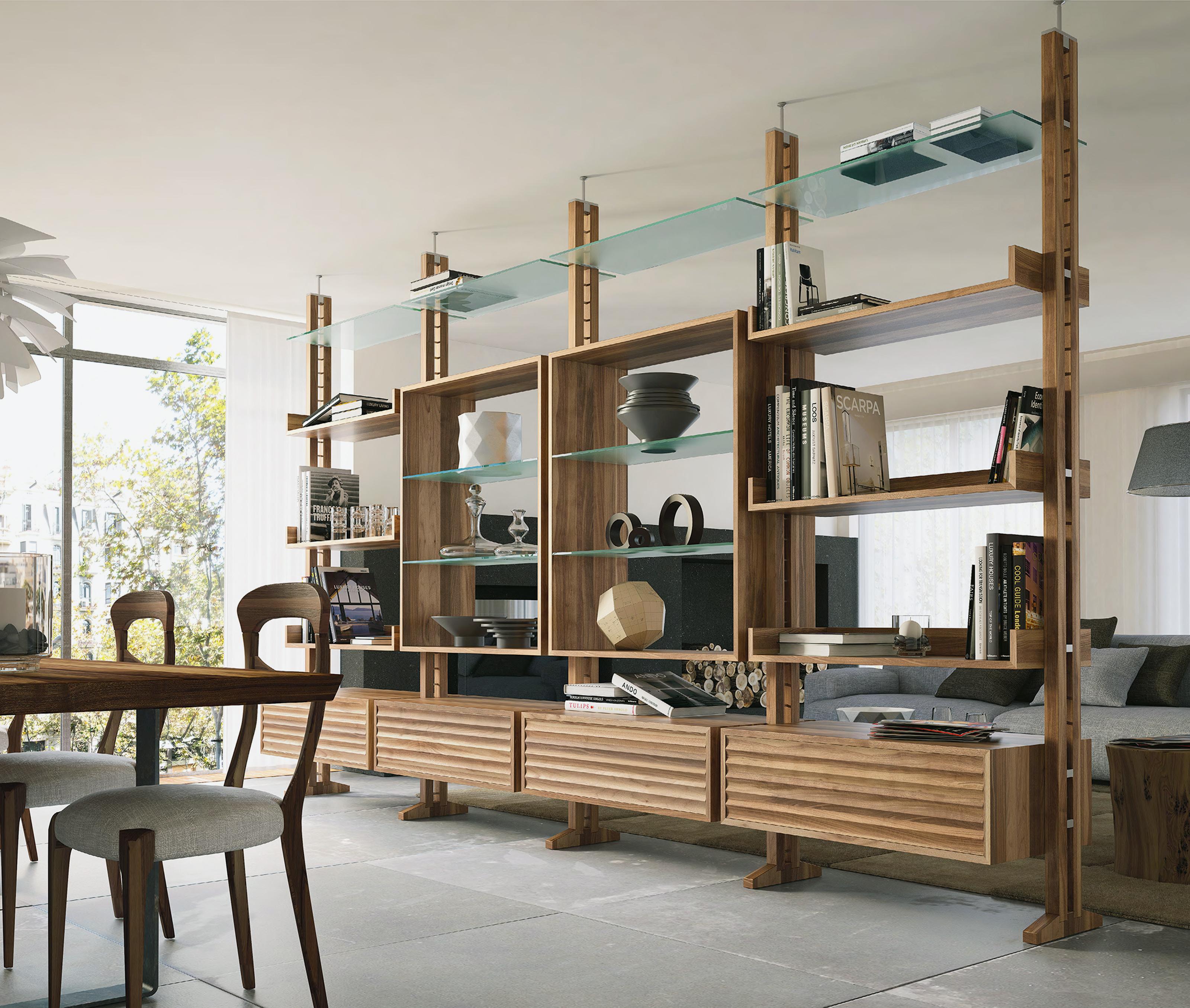 Elle C 90 Bookcase by Dale Italia
Dimensions: D 36/48 x W 90 x H 270/283 cm.
Materials: Walnut and glass.

Bookcase in solid Canaletto walnut composed from single modules. The packaging varies according to the size of the composition to be