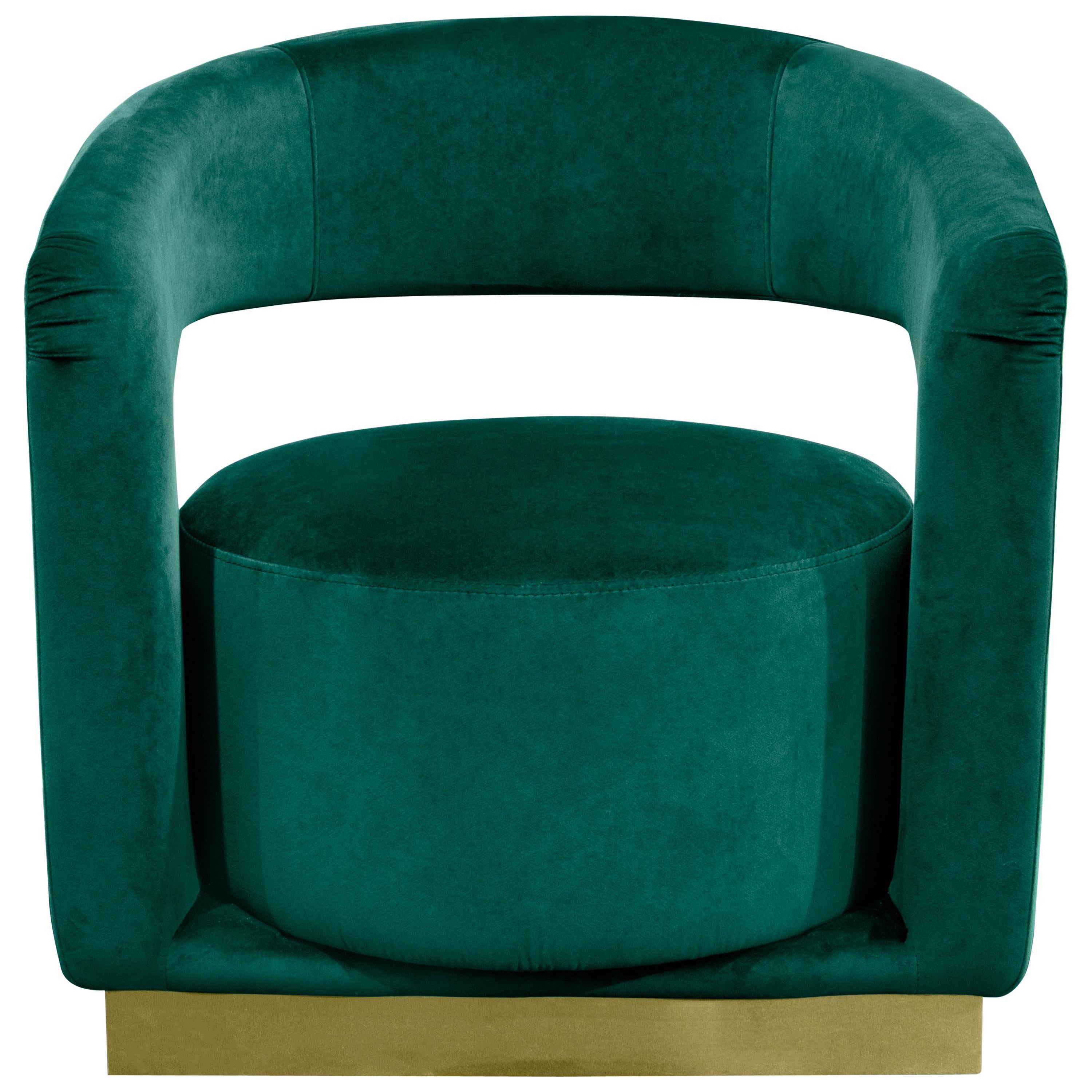 Ellen is a sophisticated armchair, featuring a modern tub design. Built on top of a polished brass base, this accent chair is upholstered with a lustruous velvet and its curvilinear open back contrasts with a rectangular shape on the front. It has a