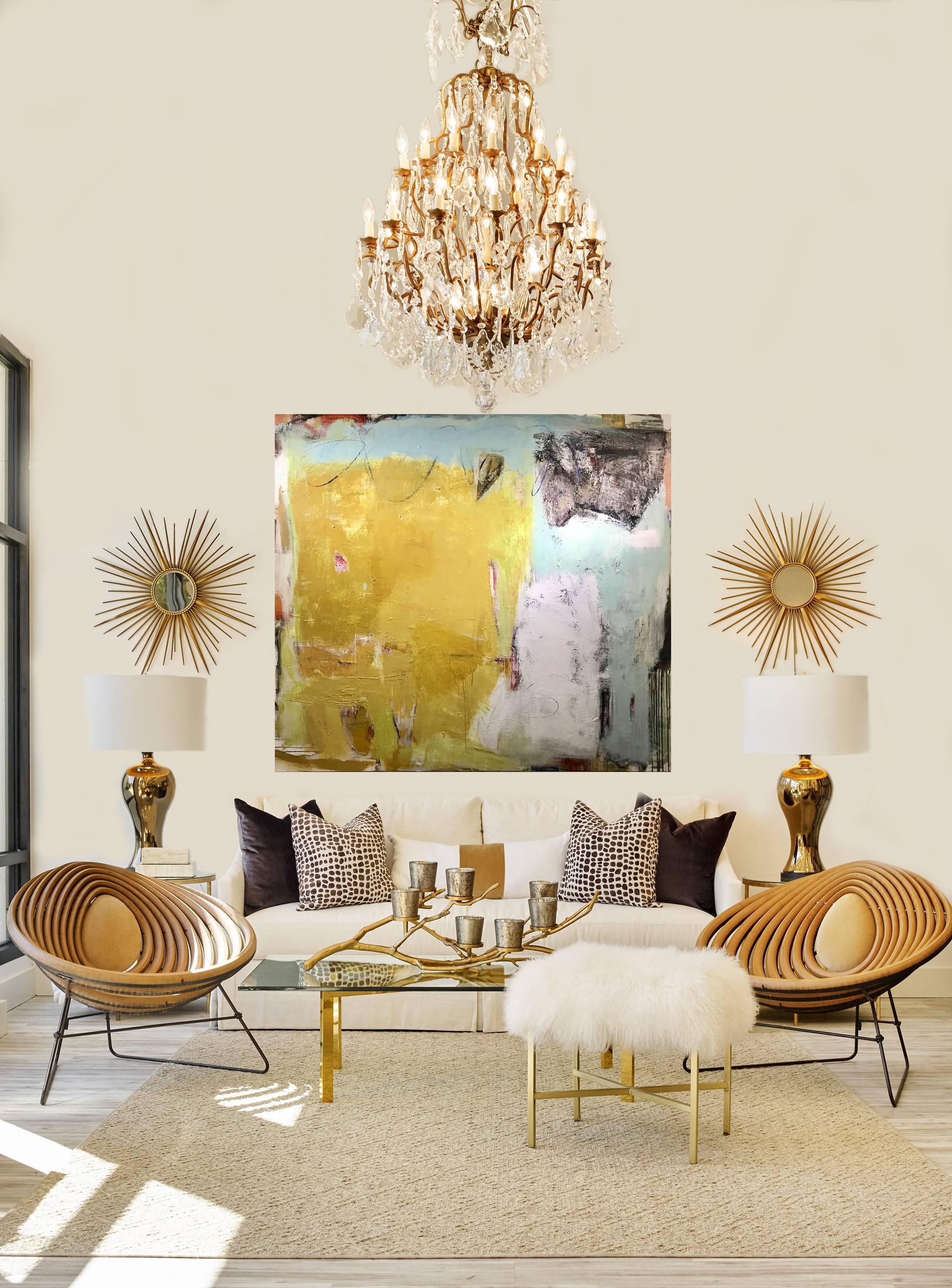 'Synergy' is a large contemporary abstract acrylic and mixed media on canvas painting created by American artist Ellen Rolli in 2018. Painted in a square format, this piece features an exquisite palette mostly made of warm yellow, juxtaposed with a