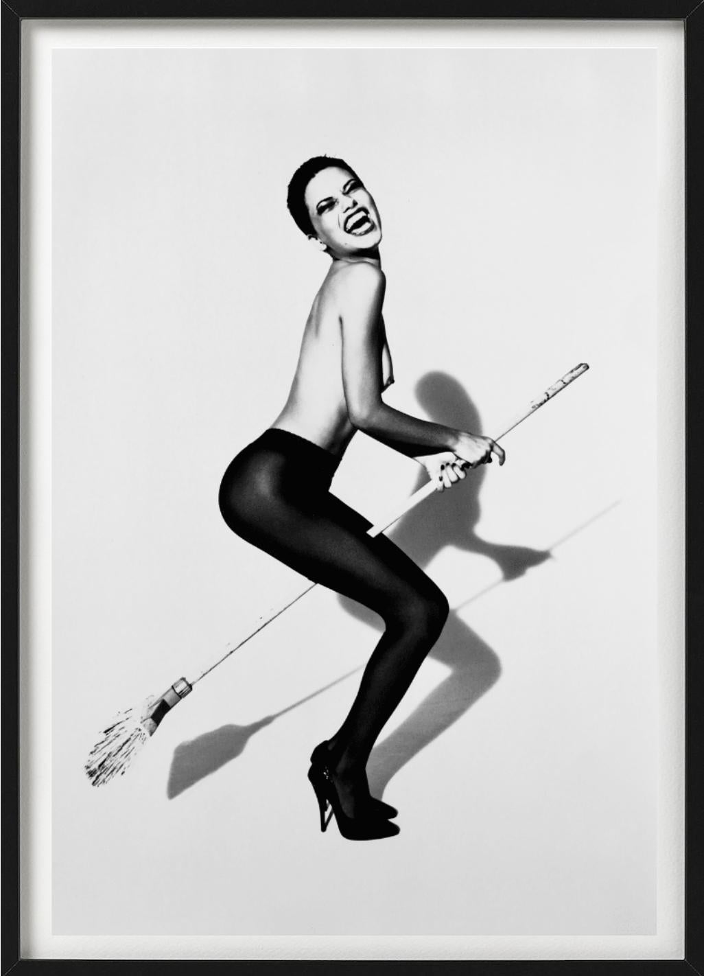 Adriana Lima Wicked III - in tights with broomstick, fine art photography, 1999 - Black Black and White Photograph by Ellen von Unwerth