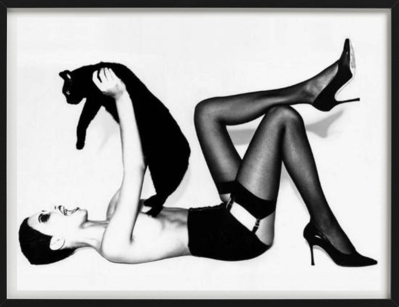 Adriana Lima Wicked II - in tights with black cat, fine art photography, 1999 - Photograph by Ellen von Unwerth