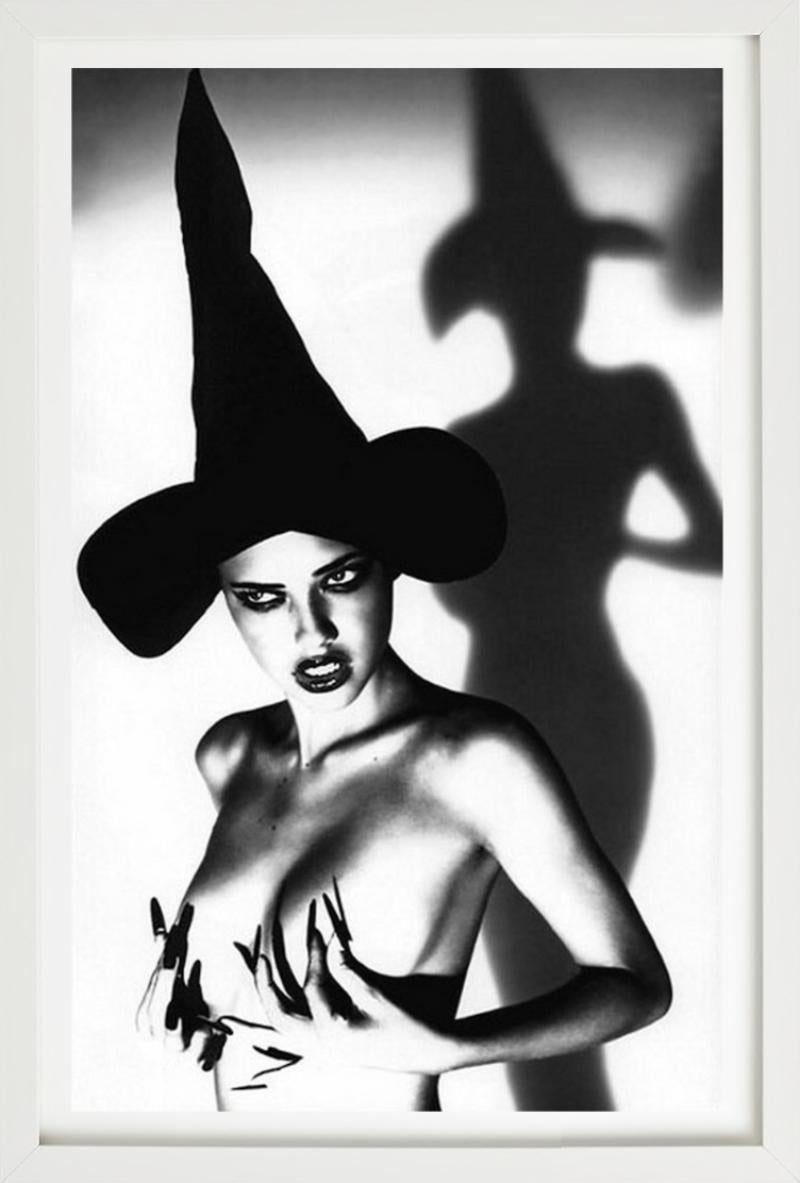 Adriana Lima Wicked - naked with witch hat, fine art photography, 1999 - Gray Nude Photograph by Ellen von Unwerth