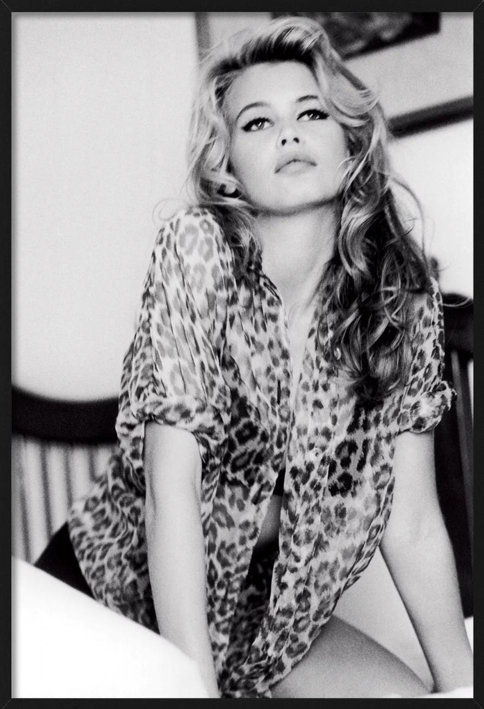 Claudia Schiffer in a leopard print blouse, sitting on a bed. Photographed by Ellen von Unwerth for Guess in Morocco in 1990.

All prints are limited edition. Available in multiple sizes. High-end framing on request.

All prints are done and signed