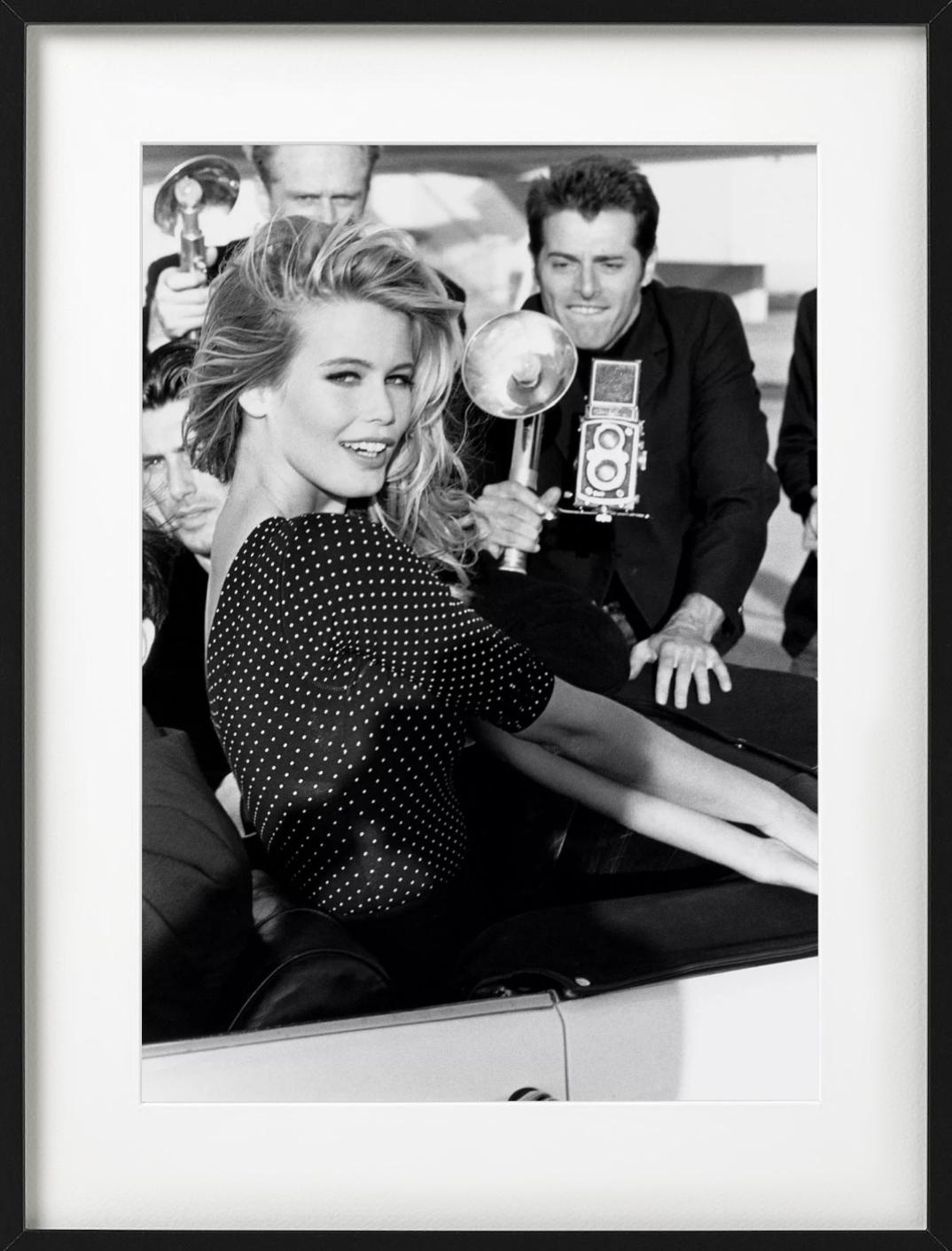 Claudia Schiffer in a polka-dot shirt, sitting in a car. Photographed by Ellen von Unwerth for Guess in Morocco in 1989.

All prints are limited edition. Available in multiple sizes. High-end framing on request.

All prints are done and signed by