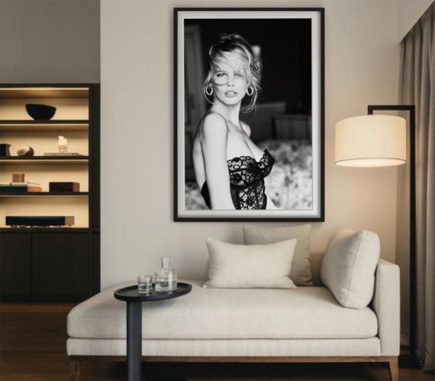 A black-and-white Portrait of model Claudia Schiffer in a black lace corset, photographed by Ellen von Unwerth for Guess in 1989.

All prints are limited edition. Available in multiple sizes. High-end framing on request.

All prints are done and
