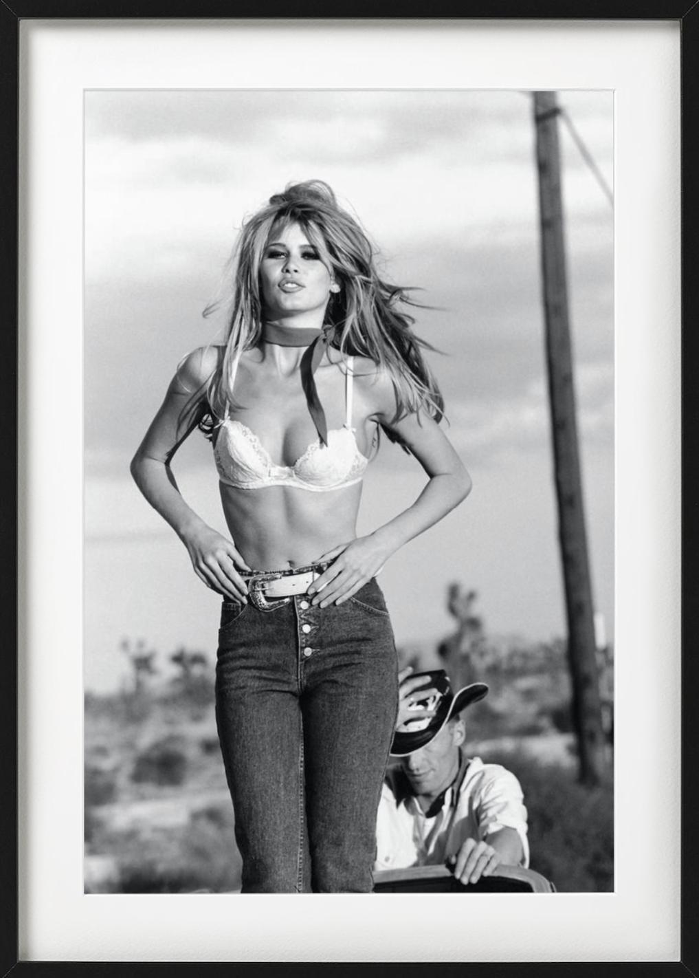 Claudia Schiffer in jeans and a white bra. Photographed by Ellen von Unwerth for the 'Guess Who' Campaign in 1989.

All prints are limited edition. Available in multiple sizes. High-end framing on request.

All prints are done and signed by the