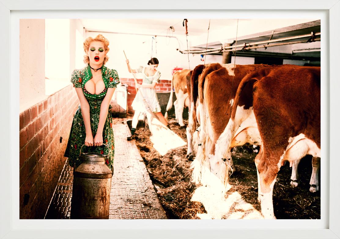 Heavy Duty -  Girl carrying Milk through cows stabel, fine art photograhpy, 2015 - Contemporary Photograph by Ellen von Unwerth