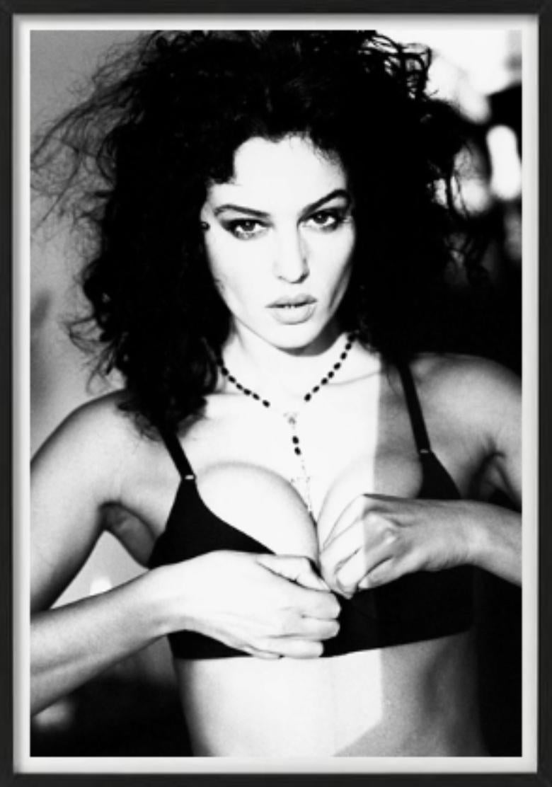 Monica Bellucci, New York - the filmstar opening her bustier with a necklace on - Photograph by Ellen von Unwerth