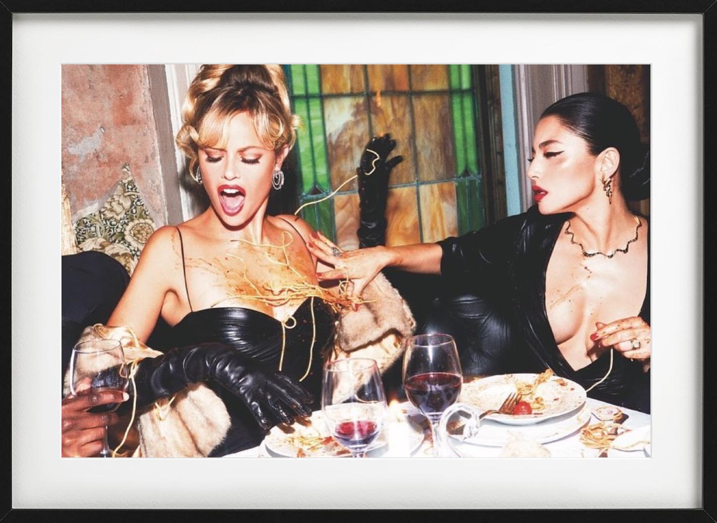 Two models during lunch, having a food fight, photographed by Ellen von Unwerth in 2023. All prints are limited edition. Available in multiple sizes. High-end framing on request. All prints are done and signed by the artist. The collector receives