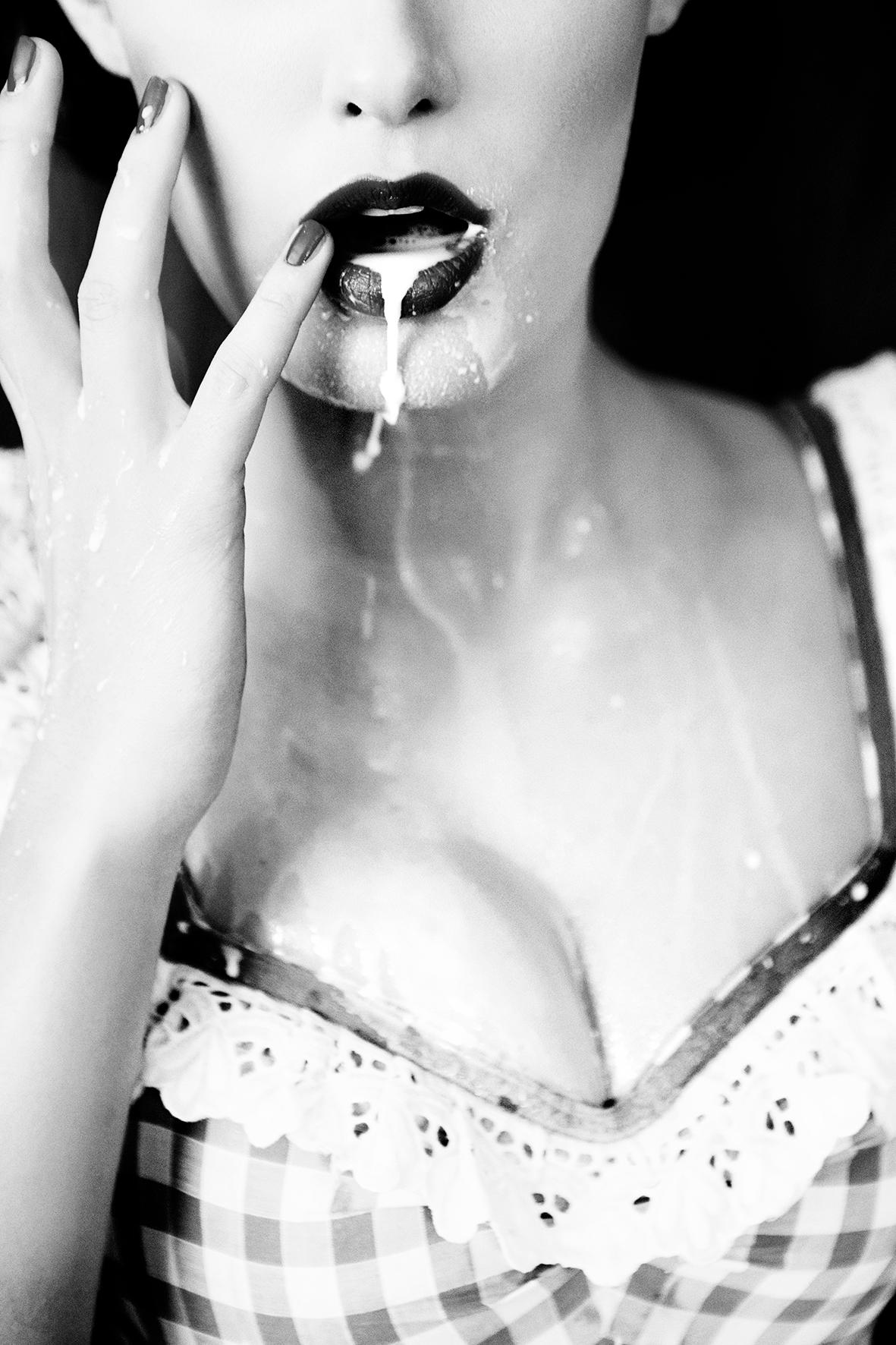 Ellen von Unwerth Black and White Photograph - Thirsty - Milk dripping out of a Model's Mouth, b&w fine art photography, 2015