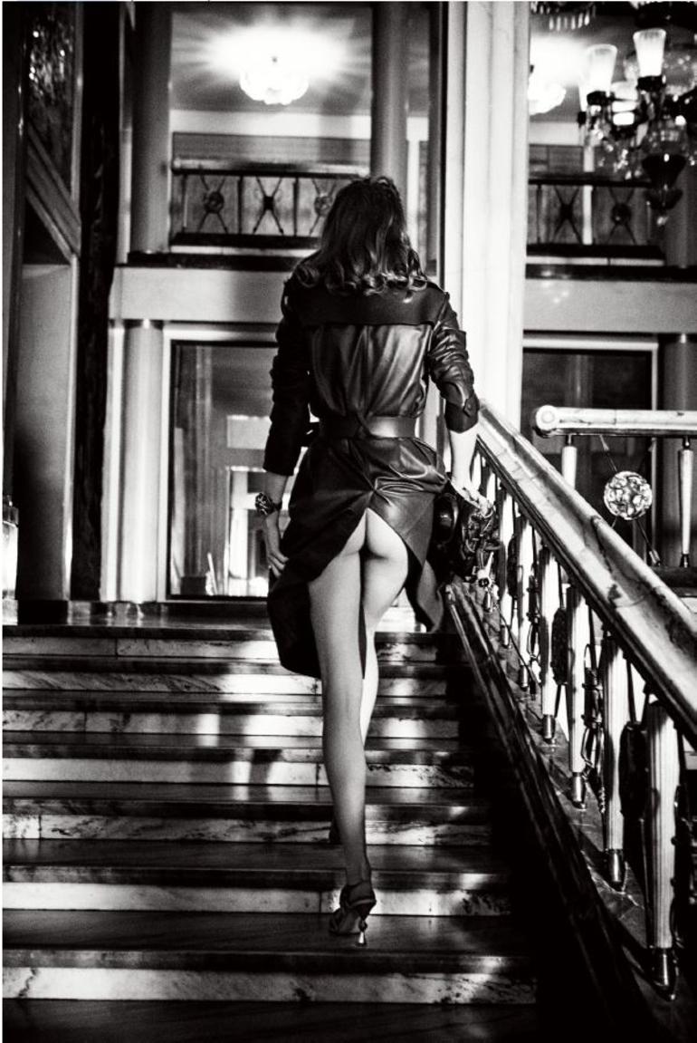 Ellen von Unwerth Black and White Photograph - Undercover, Warsaw - semi nude on a stairwell, fine art photography, 2019