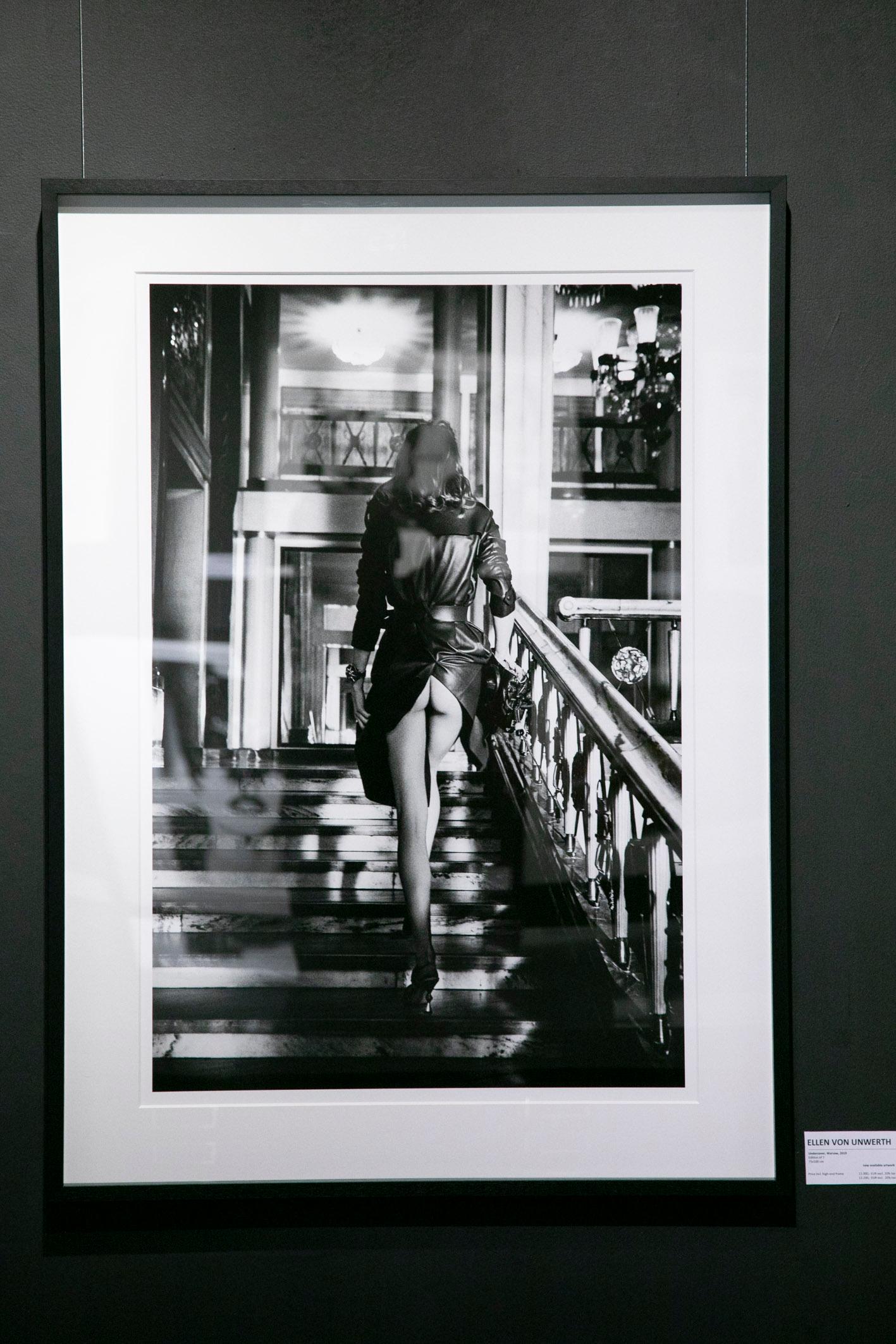 Undercover, Warsaw - semi nude on a stairwell, fine art photography, 2019 - Photograph by Ellen von Unwerth