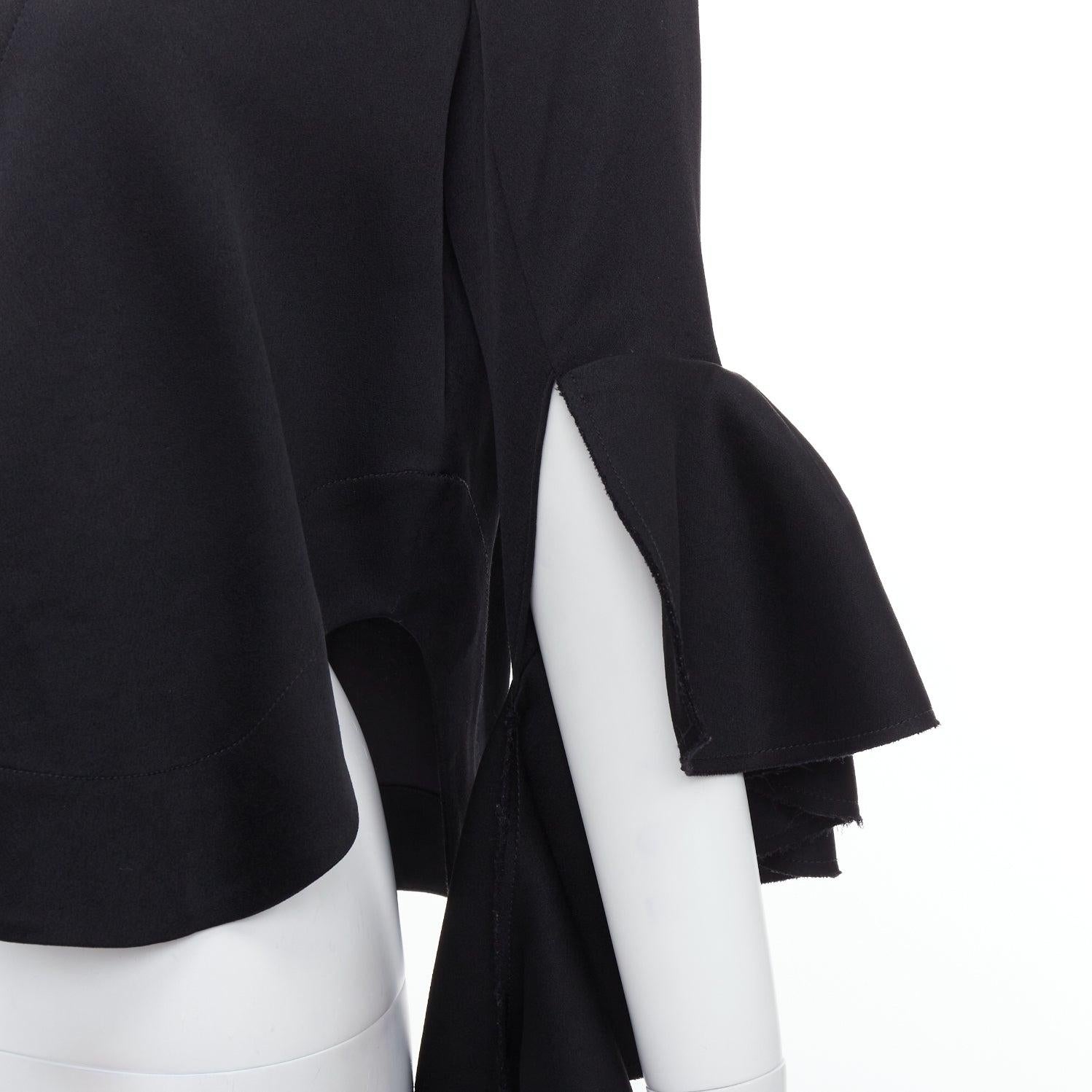 ELLERY black cascade sleeves high low hem V-neck top UK8 S
Reference: WECN/A00027
Brand: Ellery
Material: Acetate, Blend
Color: Black
Pattern: Solid
Closure: Zip
Lining: Black Fabric
Extra Details: Back zip.
Made in: Australia

CONDITION:
Condition: