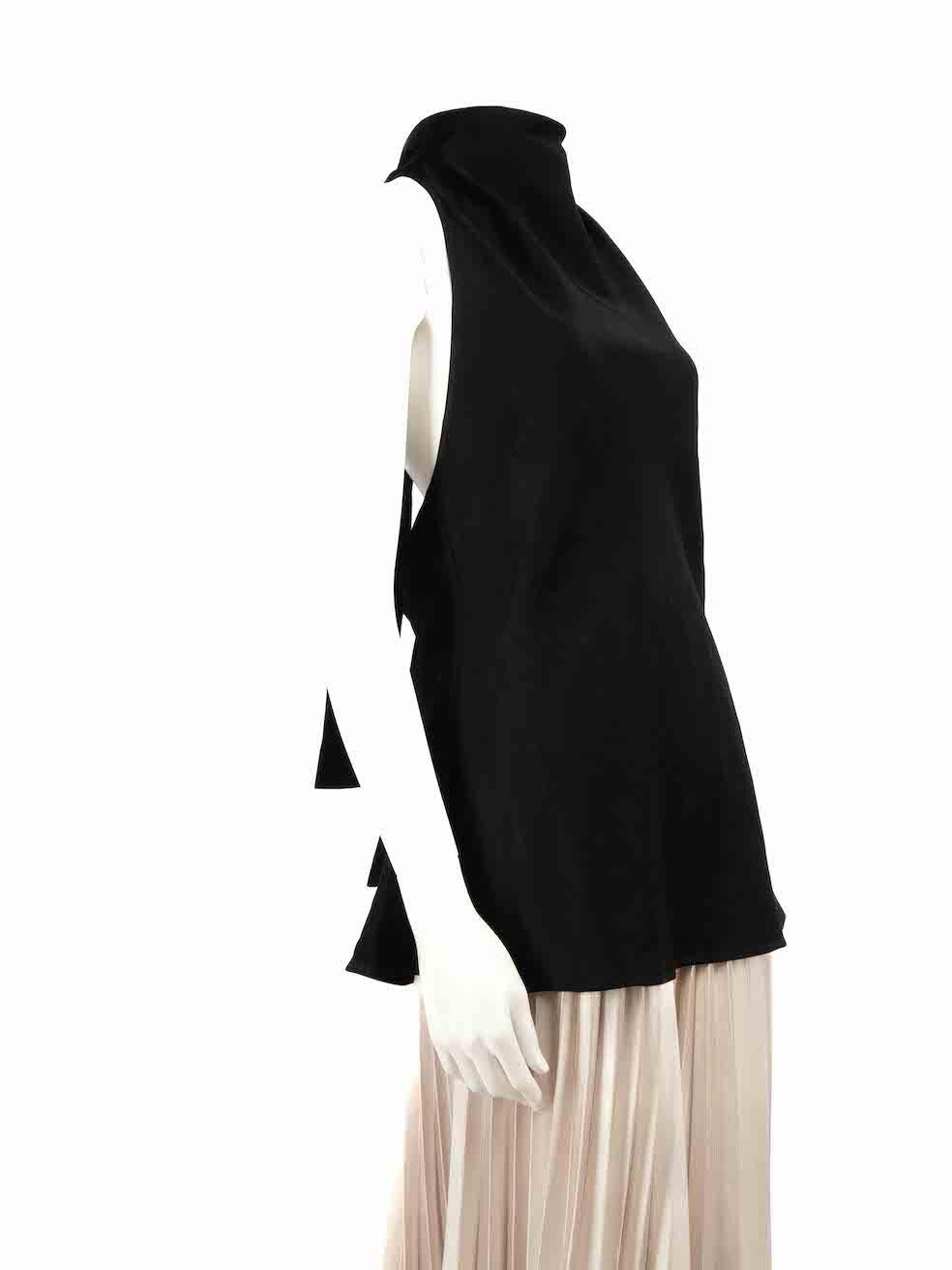 CONDITION is Good. General wear to top is evident. Moderate signs of wear to the front with plucks to the weave on this used ELLERY designer resale item.
 
 
 
 Details
 
 
 Black
 
 Synthetic
 
 Top
 
 Sleeveless
 
 Mock neck
 
 Back button