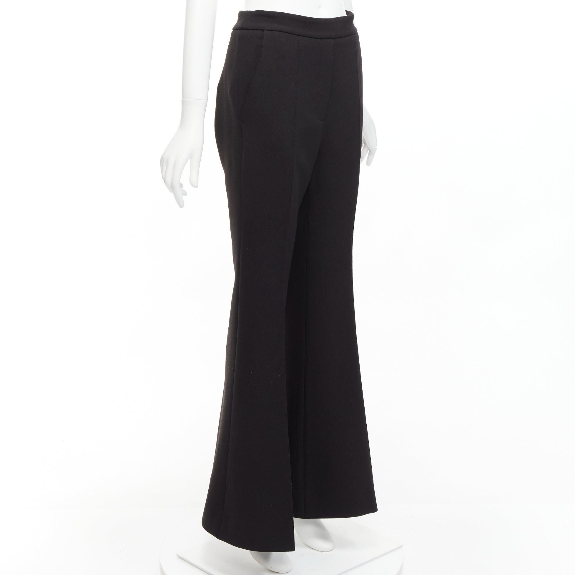 ELLERY black textured crepe minimal classic wide leg flared pants US8 L
Reference: KEDG/A00282
Brand: Ellery
Material: Polyester
Color: Black
Pattern: Solid
Closure: Zip
Extra Details: Side zip.
Made in: Australia

CONDITION:
Condition: Excellent,