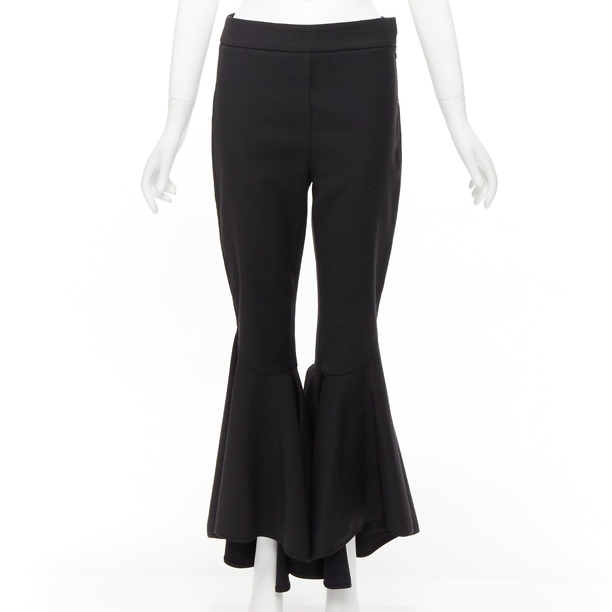 ELLERY black virgin wool blend cropped cascared flared pants US8 L
Reference: KEDG/A00283
Brand: Ellery
Material: Polyester, Virgin Wool
Color: Black
Pattern: Solid
Closure: Zip
Extra Details: Side zip.
Made in: Australia

CONDITION:
Condition: