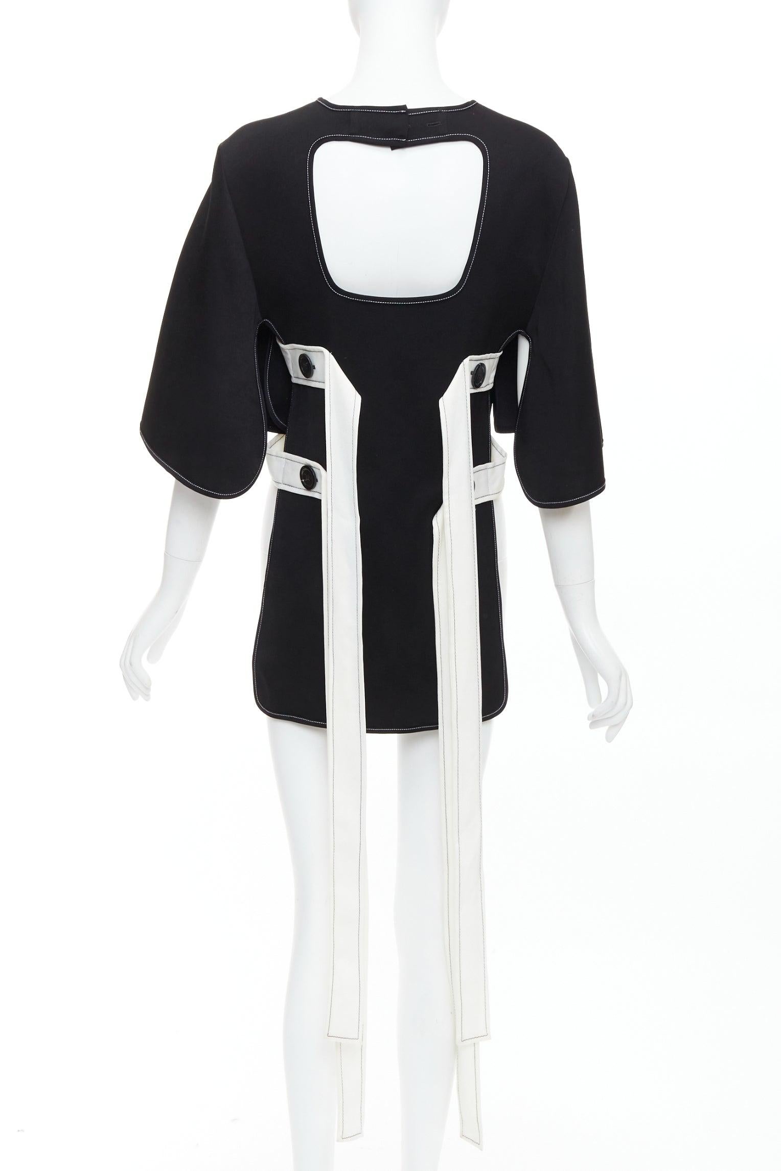 ELLERY black white bicolor cut out overstitch backless hi-low top UK8 M
Reference: MECG/A00087
Brand: Ellery
Material: Acetate, Blend
Color: Black, White
Pattern: Solid
Closure: Button
Extra Details: Open back. White applique back.
Made in: