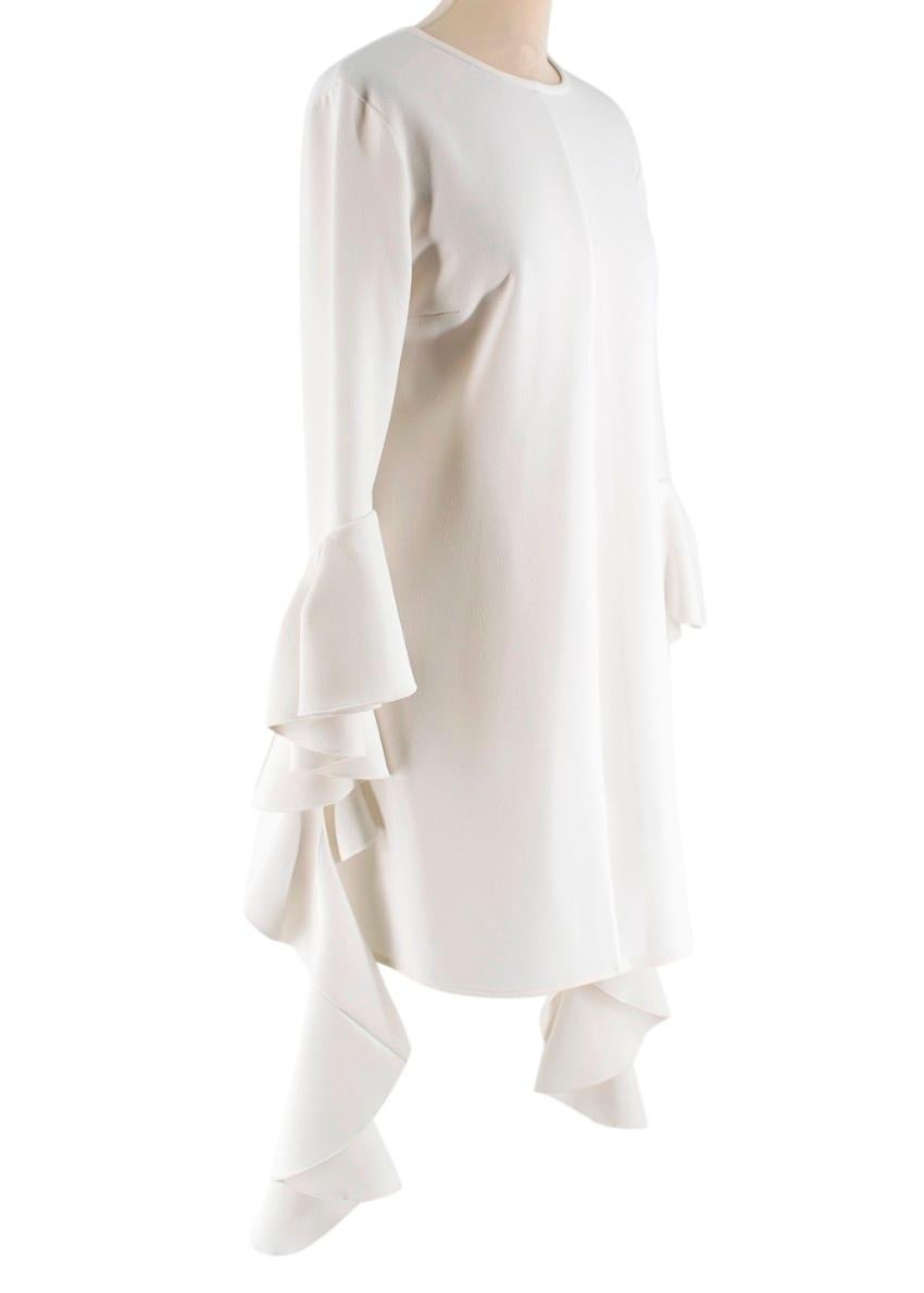 Ellery Kilkenny Frill Sleeve White Tunic

- Ruffled water fall ¾ length sleeves
- Concealed rear zipper fastening
- Round neck 
- Concealed rear hook and zip fastening

Measurements are taken laying flat, seam to seam. 

Shoulder: 12 cm
Shoulder