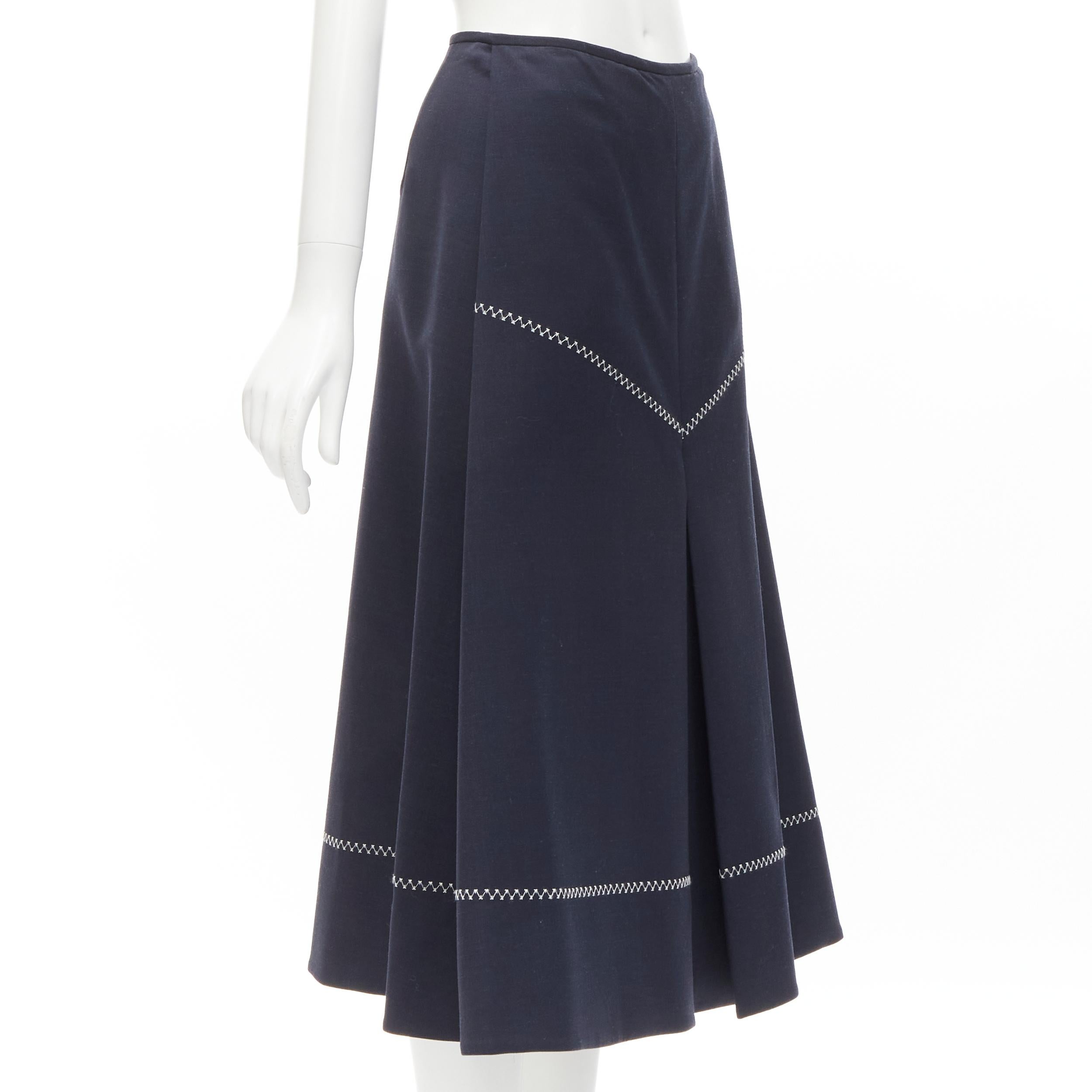 ELLERY navy polyester wool white cross hatch stitching flared skirt US2 XS
Brand: Ellery
Material: Polyester
Color: Navy
Pattern: Solid
Closure: Zip
Extra Detail: Side pockets.
Made in: Australia

CONDITION:
Condition: Excellent, this item was