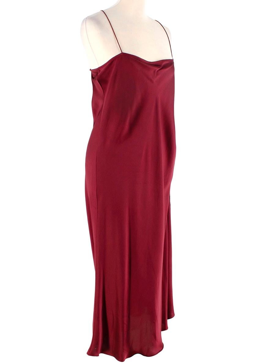  Ellery Tony Ruched Side Silk Slip Dress
 

 - Fluid silk-satin slip dress in rich burgundy hue, with rouleaux shoe string straps, and ruched side panel creating a high-low hemline 
 

 Materials 
 100% Silk 
 

 Made in Australia
 Dry clean only 
