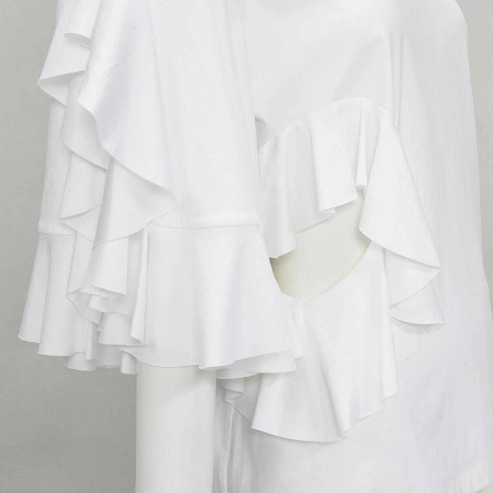 ELLERY white wide ruffle sleeves cut out side cotton tshirt US4 S
Reference: KNLM/A00035
Brand: Ellery
Material: Cotton
Color: White
Pattern: Solid
Closure: Zip
Extra Details: Zip along shoulder seam.
Made in: China

CONDITION:
Condition: Excellent,