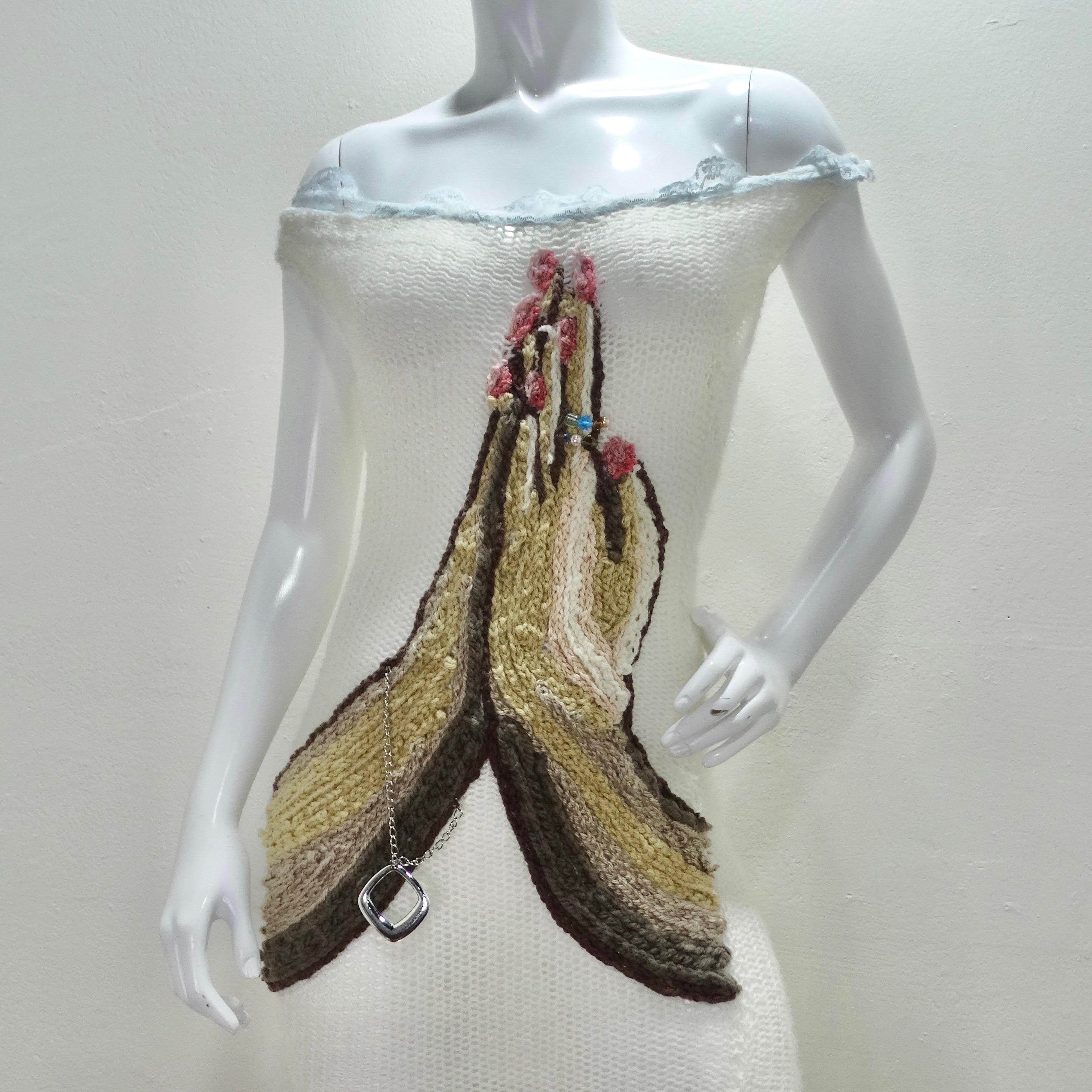 Get your hands on this one of a kind wearable work of art by emerging designer Elliana Capri! Immaculate knitted gown features stunning praying hands in the center of the dress complete with an embellished bracelet and ring! Incredible hand knit