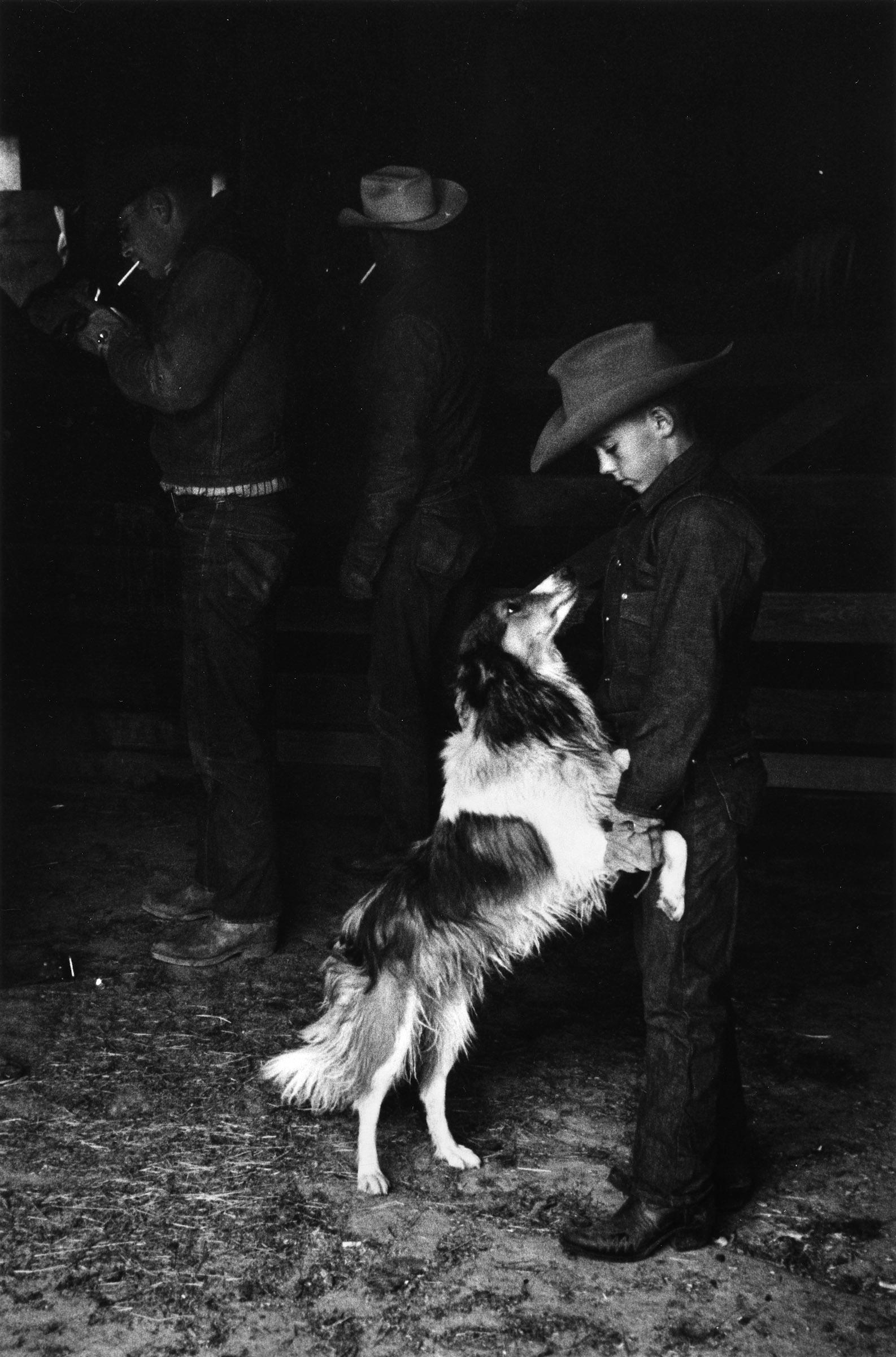 Douglas, Wyoming - Boy in Cowboy Hat & Collie.  - Photograph by Elliott Erwitt