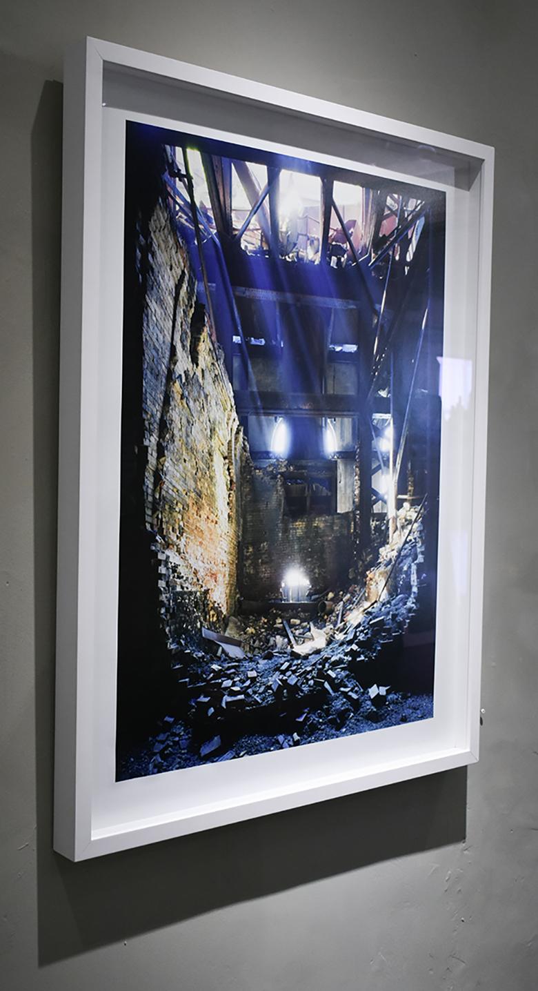 Contemporary color photograph of the interior of an abandoned power station 
35 x 25 inches unframed
41.5 x 31.5 inches in white wood frame with AR non-glare glass

This contemporary photograph of an abandoned theater interior was captured by New