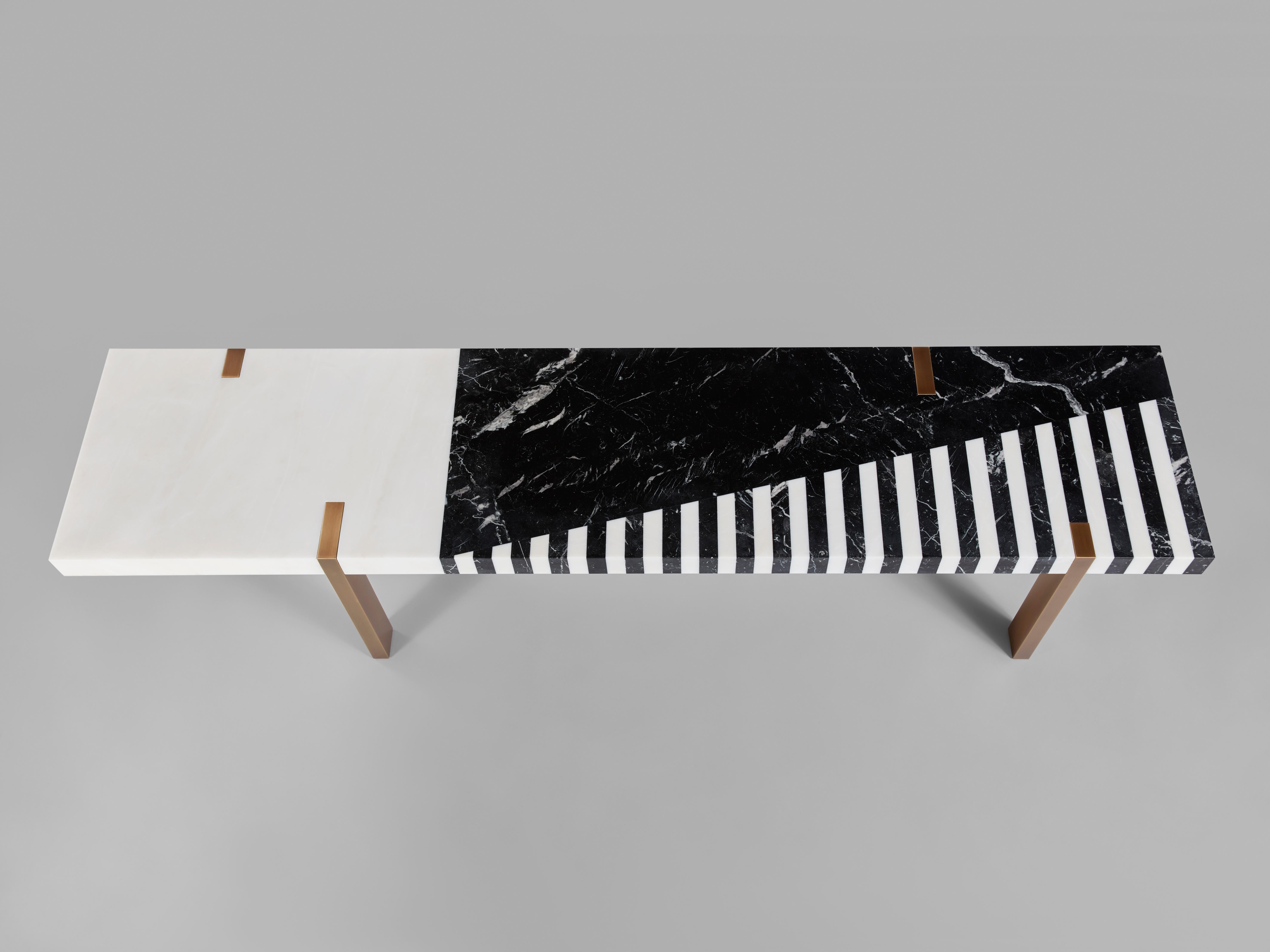 Isabelle Stanislas’ 'Ellipse' bench, that may also be used as a coffee table, is based on the masterful conjugation of three materials: white Estremoz marble, black Marquina marble, and bronze-coloured patinated brass. Each marble is imagined both