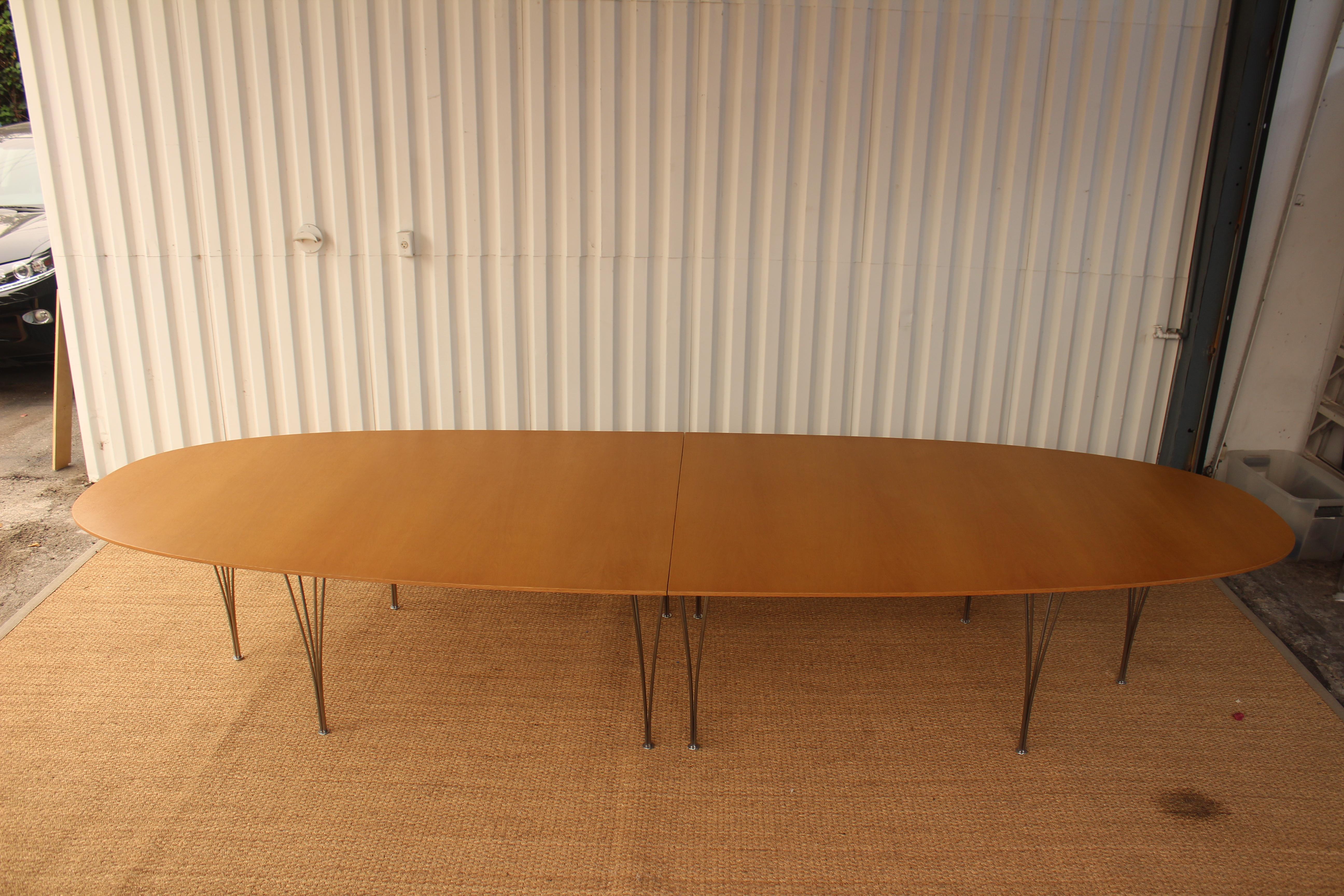 Vintage Ellipse dining table or conference table designed by Piet Hein for Fritz Hansen, Denmark, 1960s. Birch veneered top on solid steel legs. Top has been recently refinished and is in excellent condition. The chrome-plated steel legs show minor