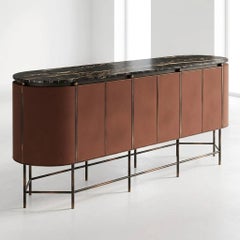 Buffet elliptique en laque mat couleur terre cuite et marbre Nero Marquina