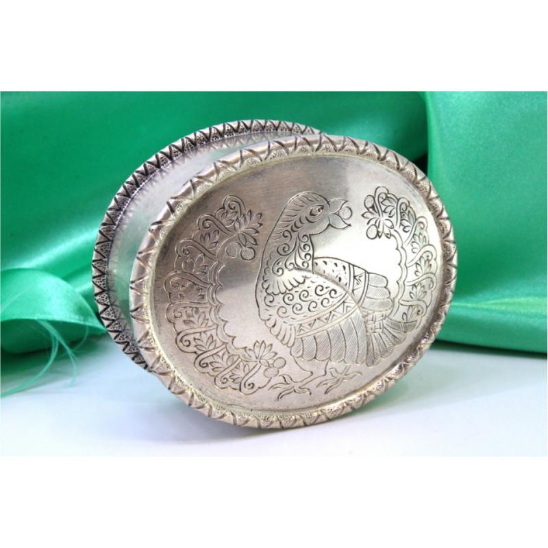 Elliptical silver box with bird-engraved lid and friezes